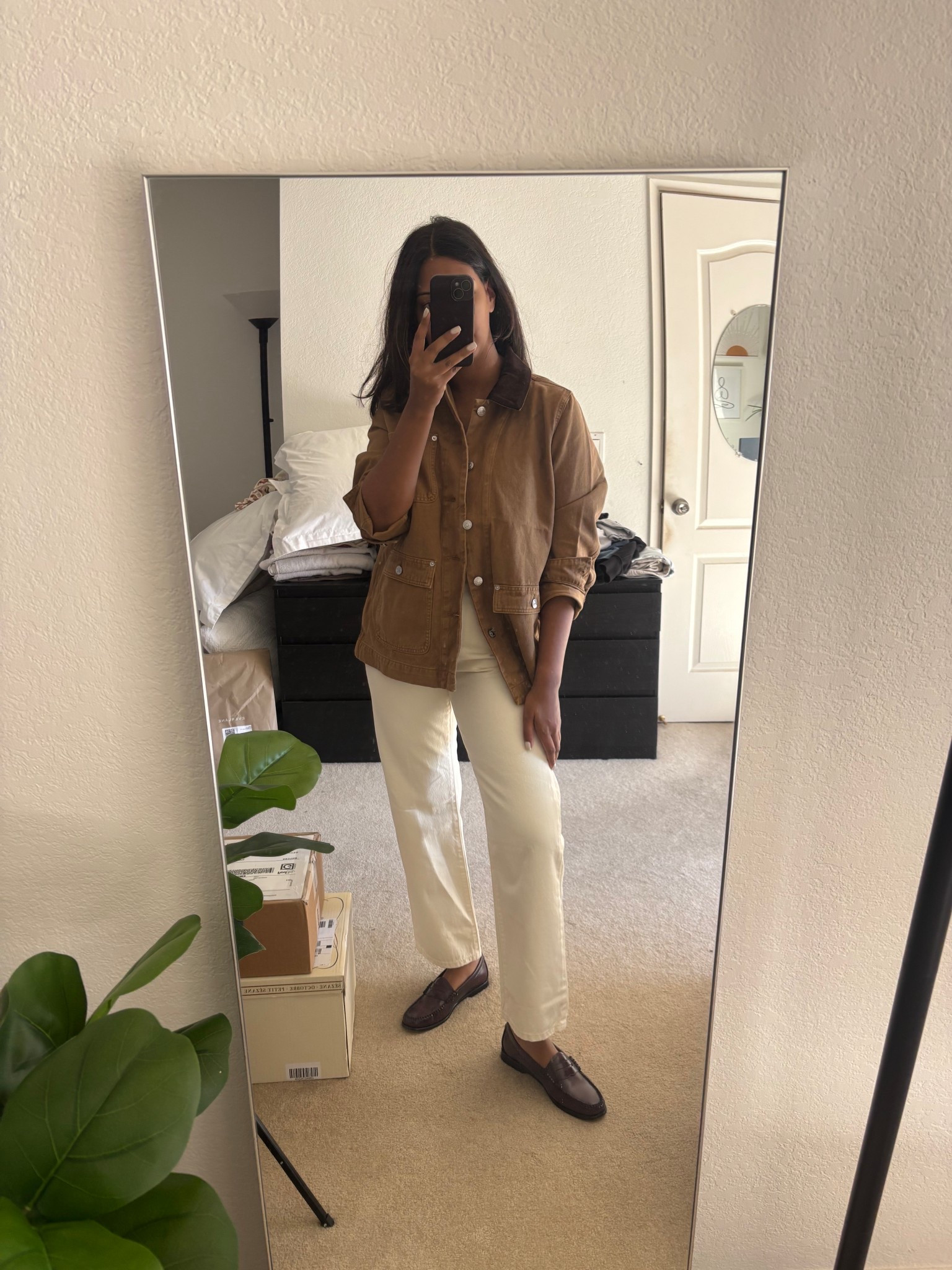 This barn jacket >>>>

Sized up two sizes for this oversized fit 