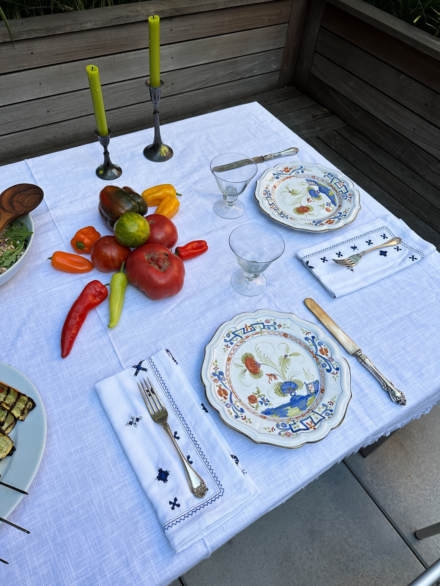 I’m always inspired by Italy when it comes to setting a summer table. These handpainted Italian plates are the star of the show; then I keep the linens simple with a pop of green candle.  Bonus: create a centerpiece made out of the season’s it-accessory tomatoes!

#LTKHome