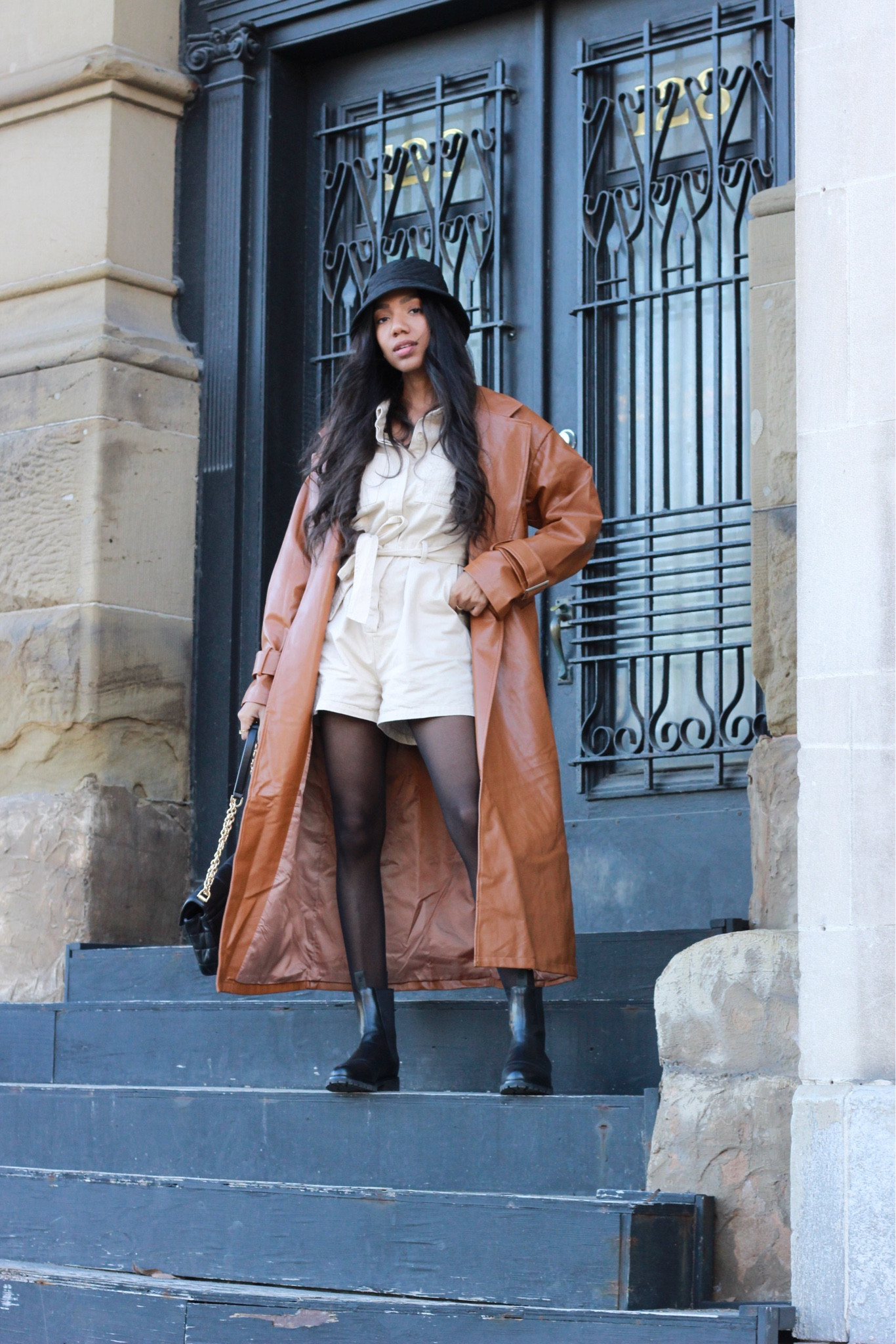 leather coat | leather trench coat | bucket hat | fall street style | romper | black influencer | Canadian influencer | Michael Kors purse | black boots | ankle boots | stockings outfit | casual fall outfit | neutral outfit | utility jumper | Chelsea boots |

#LTKstyletip #LTKSeasonal #LTKshoecrush