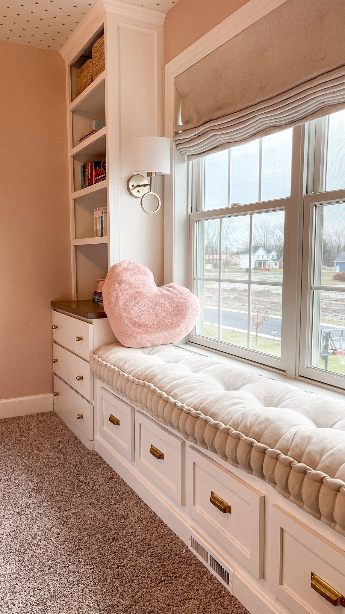 Girl’s bedroom inspiration! I used drawers from closet organization section at Home Depot to add extra storage to this built in window bench. 
Head to afinishedhouse.com for all the details on this DIY project! 
Girl’s bedroom, window bench, built in bench, bench cushion, built in storage, lacquered bronze hardware, rejuvenation hardware, wall sconce, reading light 

#LTKFind #LTKhome #LTKstyletip