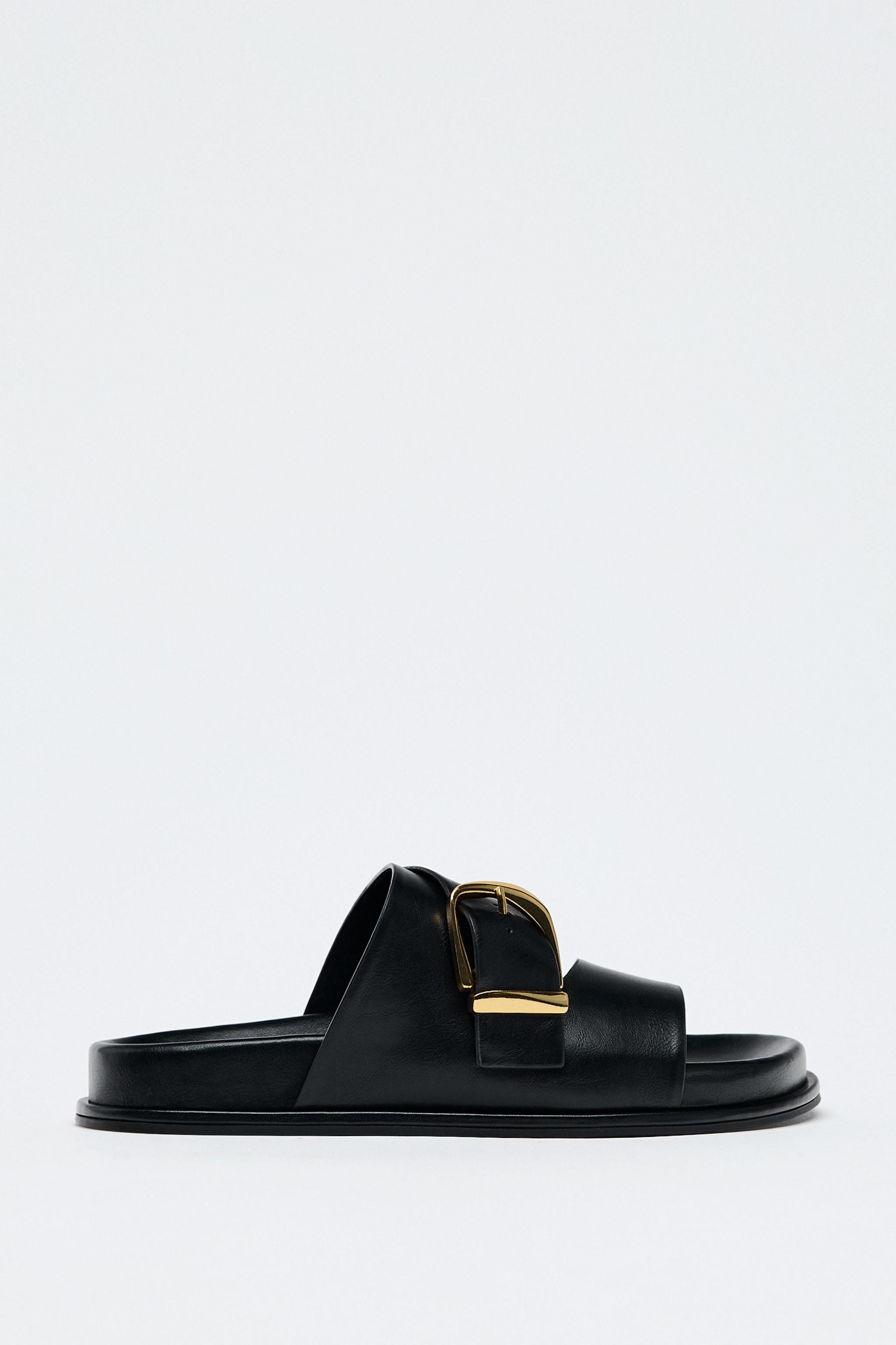Flat sandals. Wide straps with buckle detail at the front.Sole height: 1.2 inches (3 cm). | Zara US