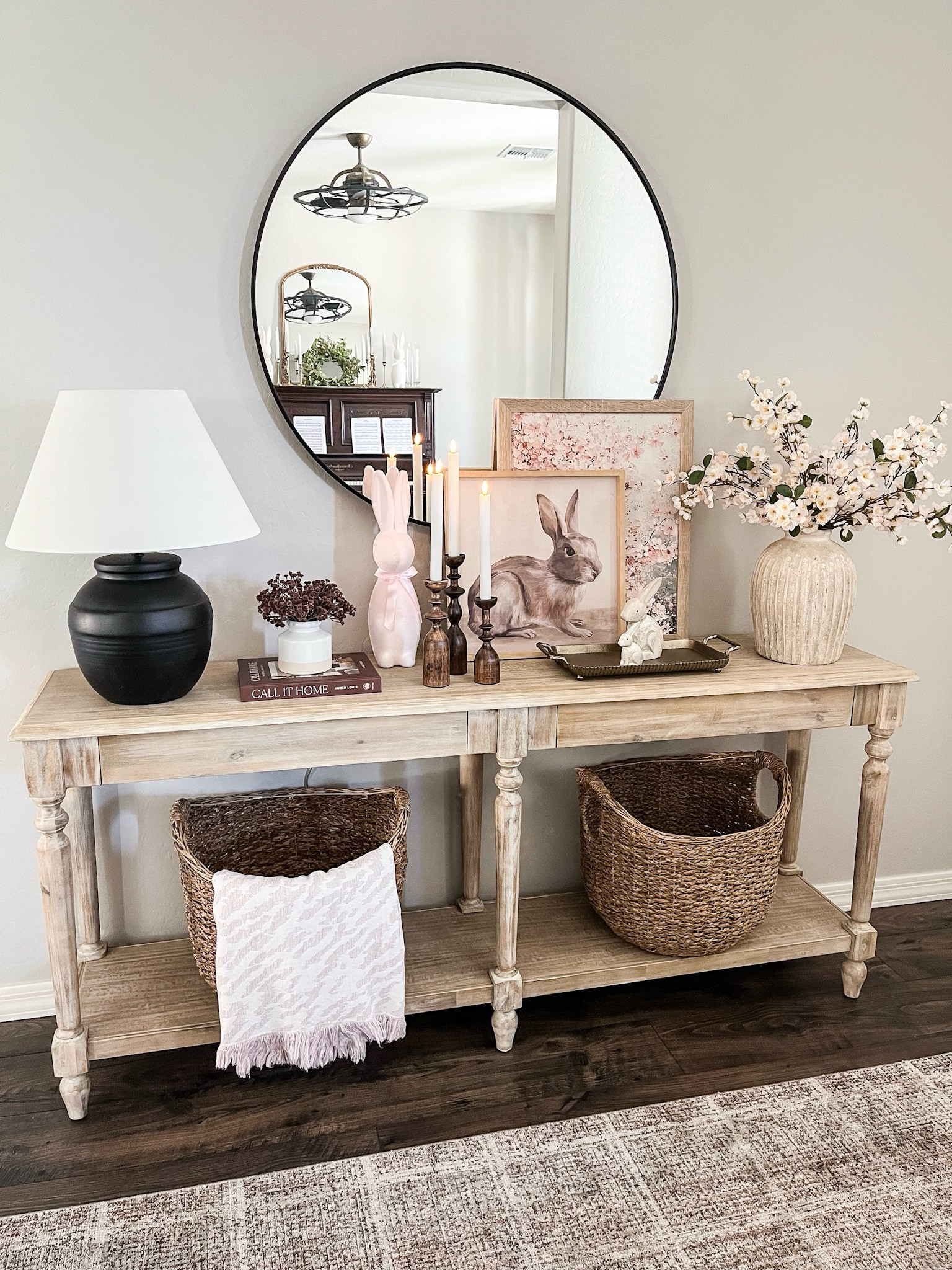 Early spring and Easter console table! Follow @lifeinmyarizonahome on Instagram for more inspiration.

I updated my entryway table for spring with this bunny canvas and
layered it with the cherry blossom print. These cherry blossom stems and adorable wooden bunnies are giving me all the spring vibes.
For reference I'm using 4 cherry blossom stems here and the cherry blossom print is in the 16×20 size that I had printed and then framed. 

#LTKFindsUnder50 

#LTKSeasonal #LTKHome