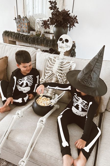 The cutest Halloween finds I’m loving from Walmart right now! These cute PJs are under $15, this posable Skelly is under $30 and the couldron bucket is perfect for  popcorn 🍿 during movie nights! #walmartpartner #walmart #walmartfinds #IYWYK #walmartdeals #halloween 

#LTKkids #LTKfamily #LTKHalloween