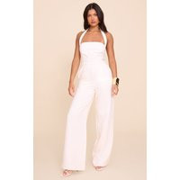 Cream Premium Woven Halter Neck Wide Leg Jumpsuit | PrettyLittleThing US