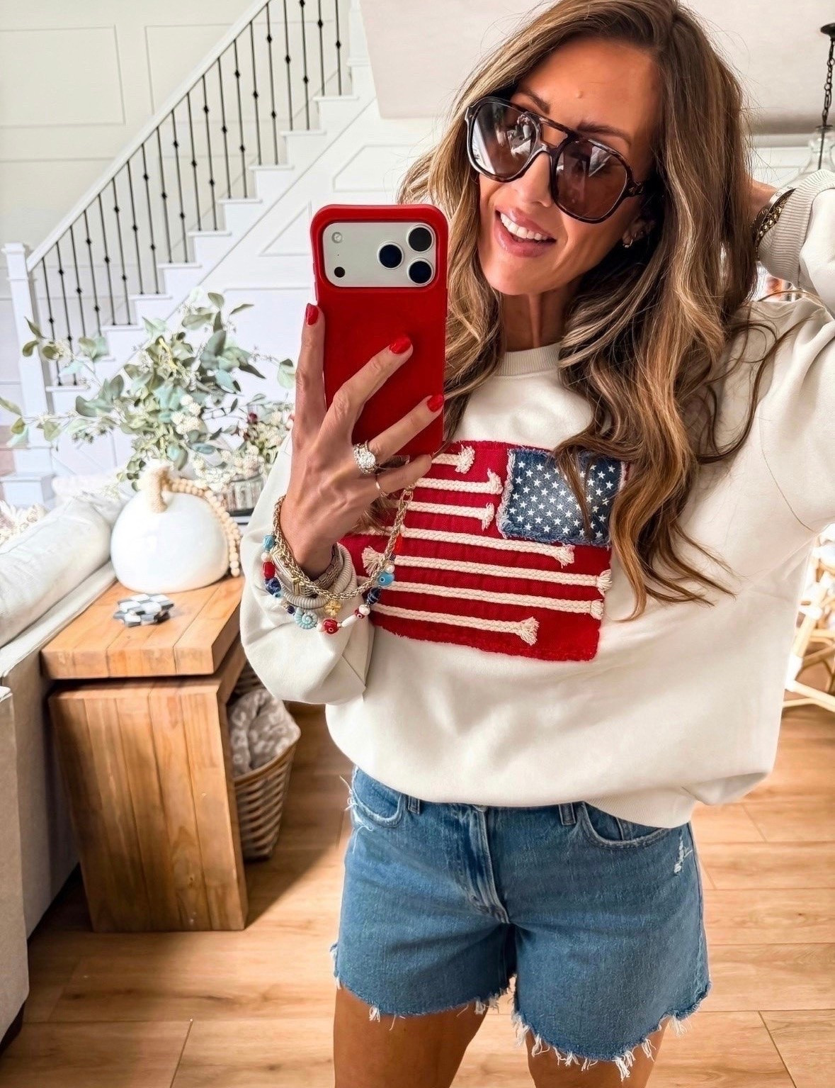 This patriotic sweatshirt is one of those pieces you’ll reach for all summer long. The flag detail is so cute for the Fourth of July, lake days, cool evenings, and casual weekends. Paired with denim shorts for an easy Americana look.

patriotic sweatshirt, American flag sweater, Fourth of July outfit, summer style, denim shorts outfit, holiday fashion, lake day outfit, casual weekend look, red white and blue style, summer sweatshirt, patriotic fashion, USA inspired outfit, themominstyle

#LTKootd #LTKSeasonal #LTKTravel