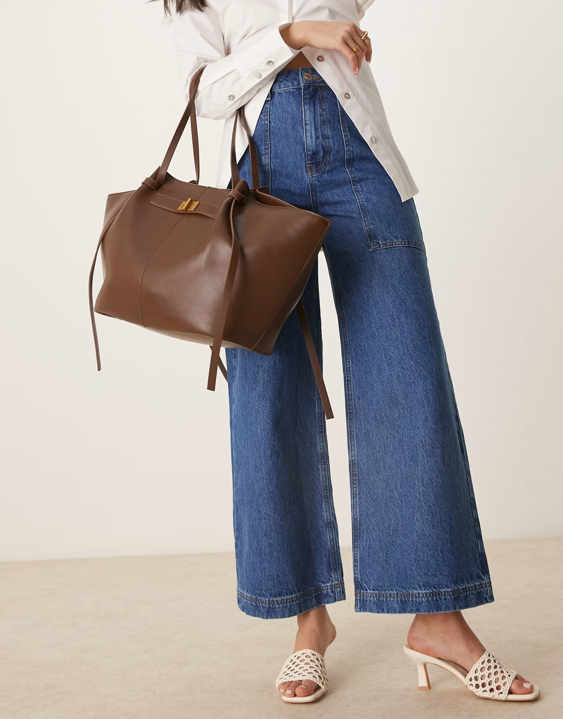 Gina Tricot faux leather medium tote bag with strap and clutch detail in dark brown | ASOS (Global)