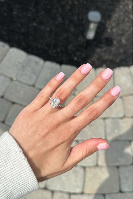 Oval cut faux diamond engagement ring for under $60! Perfect alternative for traveling or water activities to keep your real ring safe at home.



#LTKGiftGuide #LTKstyletip