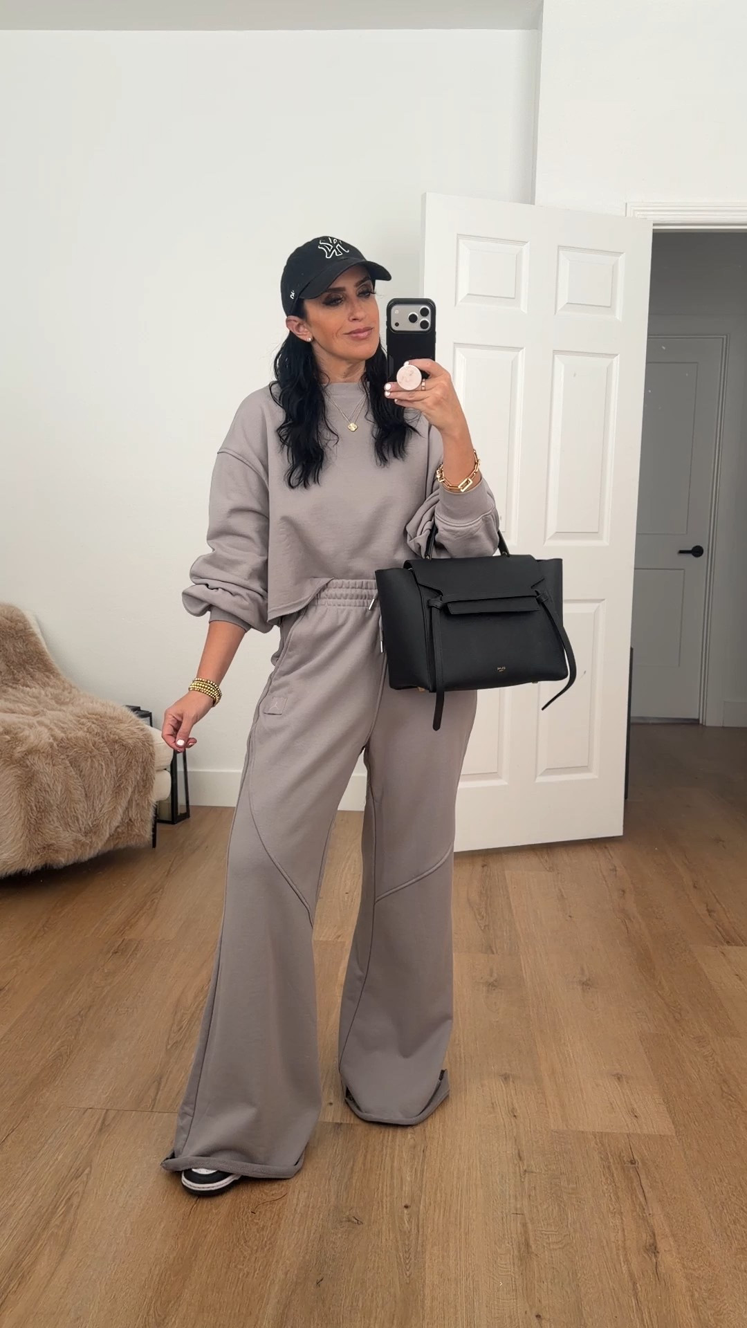 Jordan Flight Fleece Women's Flared Pants wearing size medium. Jordan Flight Fleece Women's Mod-Crop Crew-Neck Sweatshirt size medium. 