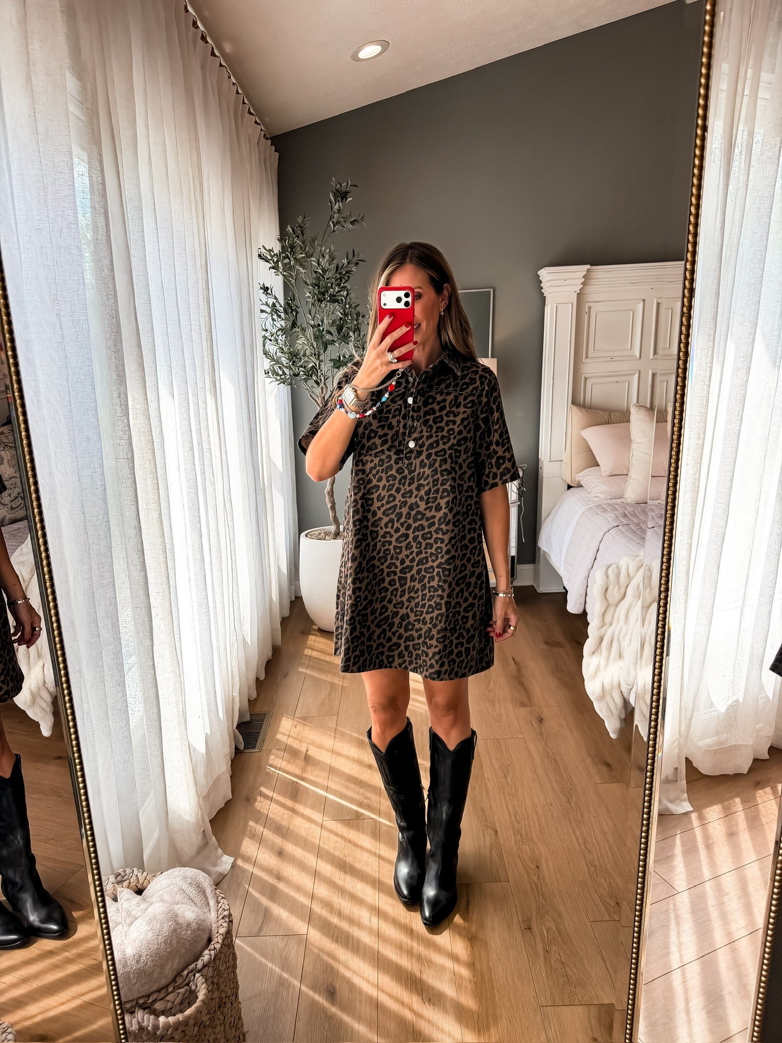 This leopard print shirt dress is such a fun way to lean into fall without piling on heavy layers. I love it styled with black cowboy boots for an easy western inspired outfit that works for dinner, fall events, or a casual night out.

leopard print dress, fall outfit idea, western style, cowboy boots outfit, shirt dress, animal print outfit, fall fashion, themominstyle

#LTKootd #LTKSeasonal #LTKOver40