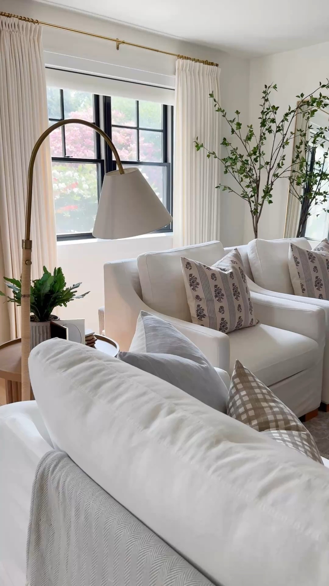 A few of my favorite pieces that make this layered neutral living room feel warm, timeless, and inviting. White slipcovered furniture, block print pillow covers, natural textures, and a mix of classic finishes create a look that's effortlessly collected and made for everyday living. Think timeless coastal charm with a refined, collected feel. Linking all of my favorites—from the best-selling coffee table and durable rug to the decor pieces I reach for again and again.

#LTKSeasonal #LTKSaleAlert #LTKHome