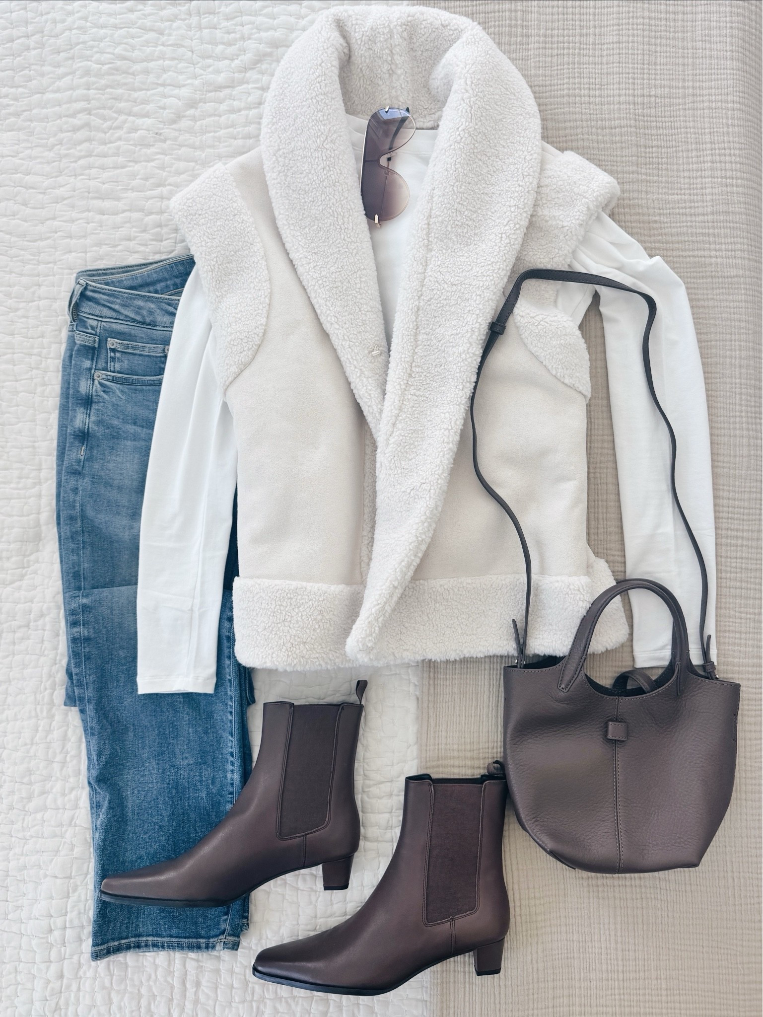 Fall outfit. Shearling vest by @cellajaneblog !  I have my usual size in all items. 

Brown leather booties. Cigarette jeans.

#LTKootd #LTKOver40 #LTKTall