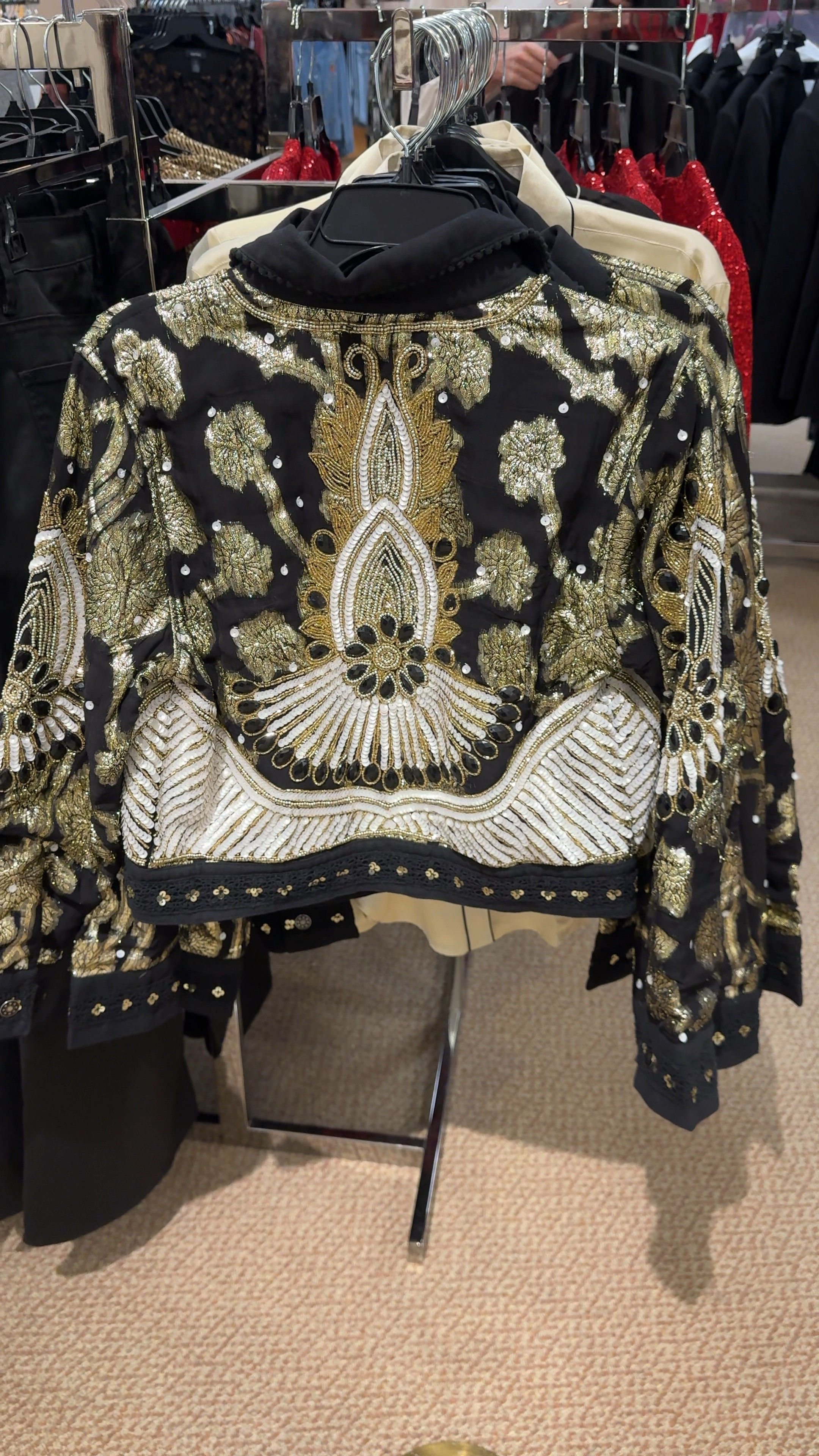 Talisman Torero Beaded Embellished Design Point Collar Button Front Denim Jacket

Reba Crepe Rhinestone Fringe Notch Lapel Long Sleeve Button Front Coordinating Blazer with Crepe Rhinestone Fringe High Rise Flat Front Full Length Coordinating Trousers
Woven Poplin Sequin Embroidered Point Collar Dropped Long Sleeve Shirttail Button Down Shirt by Reba
Woven Mesh Sequin Ruched Crew Neck Long Peasant Sleeve Back Keyhole Blouse also comes in red

Anya Rhinestone Fringe Point Collar Long Sleeve Coordinating Jacket by Gianni Bini
Also comes in white. 

#LTKHoliday #LTKOver40 #LTKSeasonal