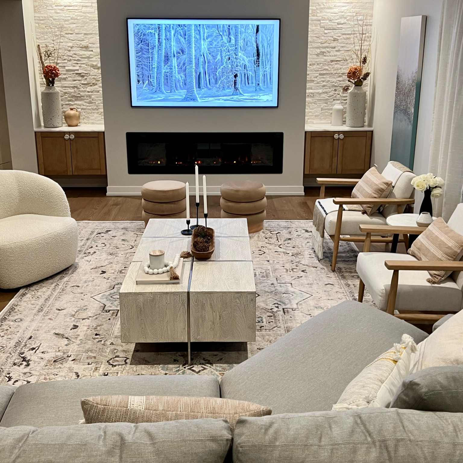 Living room details. 

Follow @homesweet_dom on Instagram and Tik Tok for home design, decor and styling inspiration. 

Target new arrivals, Target and Studio McGee ottomans, CB2, Gwyneth boucle swivel chair, Z Gallerie, coffee table, wooden accent chair, modern farmhouse, modern, accent wall, throw pillows, Ruggable, rug, Kamran Ivory Opal, Clifton coffee table, large vase, Crate and Barrel, Ema vase, frame TV, Samsung, side table, black marble side table, 

#LTKFind #LTKSale #LTKhome
