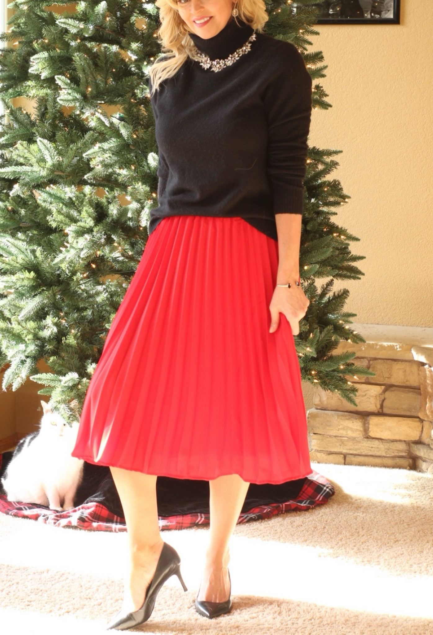 Holiday outfit idea. Elegant holiday outfit that is comfortable and looks great on everyone! Wearing a small in the skirt and medium in the sweater. #holidayoutfit . 

#LTKHoliday #LTKOver40 #LTKParties
