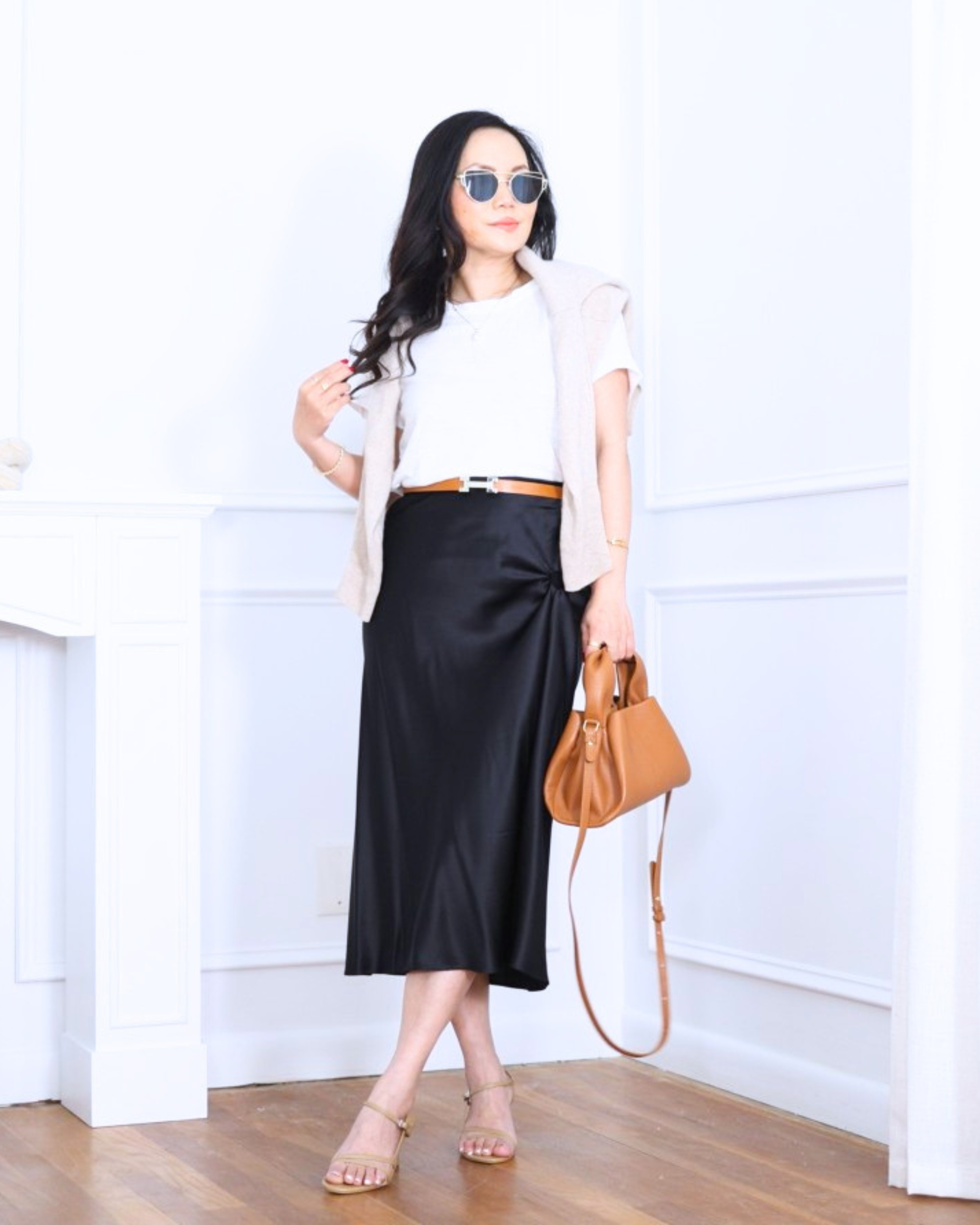 White tee from Madewell paired with a silk skirt, bag, and heeled sandals from Quince — simple pieces that come together in an effortlessly polished way. I'm 5'2, wearing size XS. 

 #LTKootd #LTKOver40 #LTKPetite