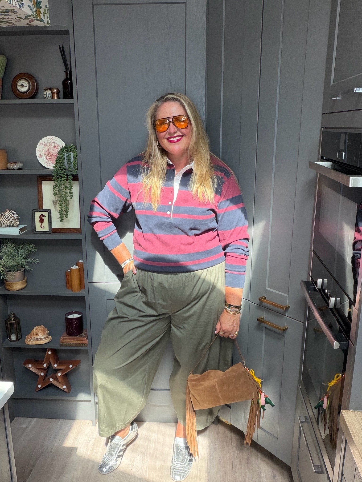 Khaki trouser, silver trainers, rugby shirt, brown bag, brown sunglasses

#LTKsummer #LTKautumn #LTKplussize