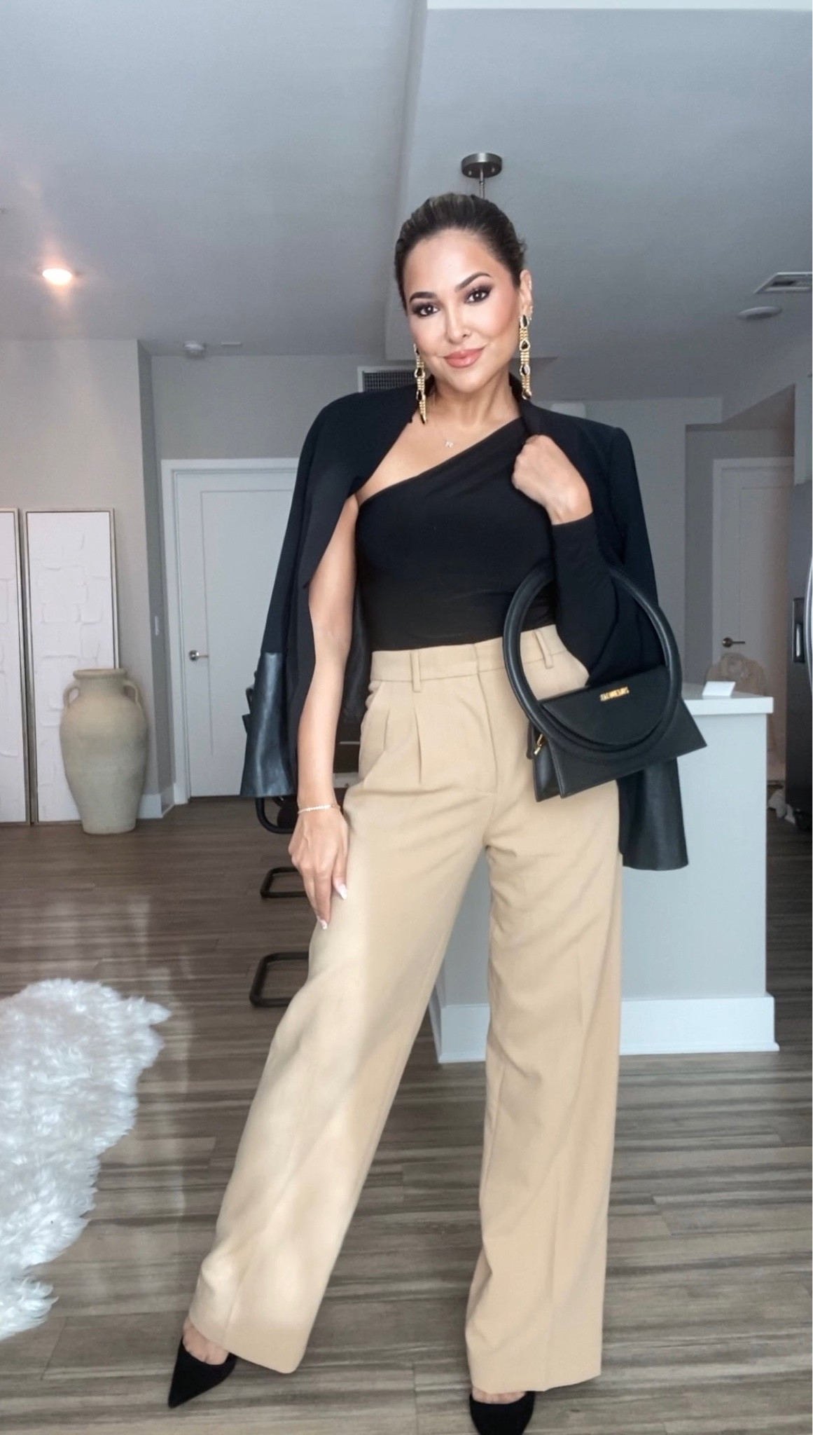 #GRWM + Some Self-Love Reminders 🤍

Styling camel trousers — great for an elevated business casual look!  You can also throw on flats with a more fitted trouser bottom for a more casual look.

#Outfit Details:
top — @clubllondon 
jacket & pants — @zara 
bag — @jacquemus 
shoes — @aquazzura
earrings — @juliavaughn

#LTKunder50 #LTKstyletip #LTKbeauty