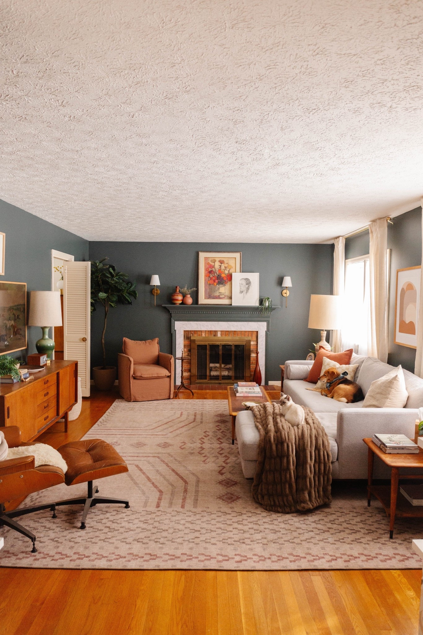 Get the look of our retro mod living room with these home décor finds! ⭐️ (paint color: Homburg Gray)

#LTKHome