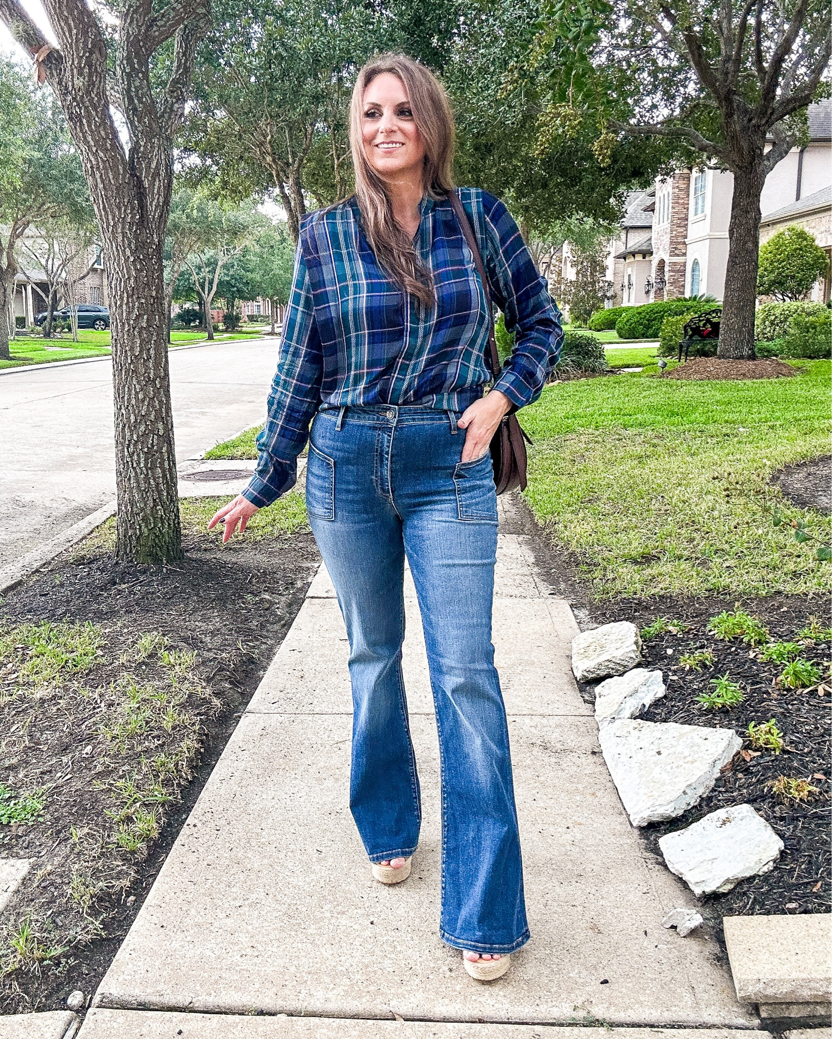 The cutest flare jeans that fit like a glove! Love the pockets in the front, they give 70s vibes. I’m in a size 10 in the jeans and a large in the top. Use my code LORI for 15% off your entire purchase! 

#LTKmidsize #LTKover40 #LTKstyletip