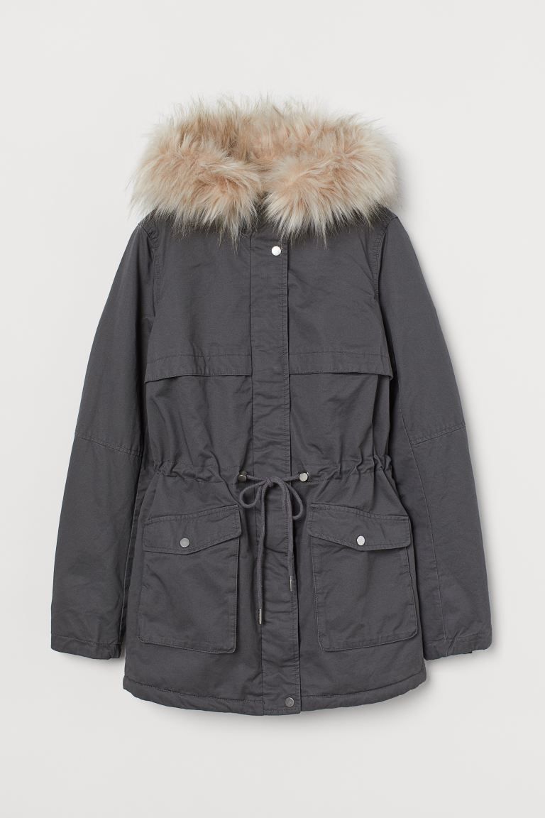 Short, faux shearling-lined parka in woven cotton fabric with a faux fur-trimmed hood. Stand up c... | H&M (US + CA)