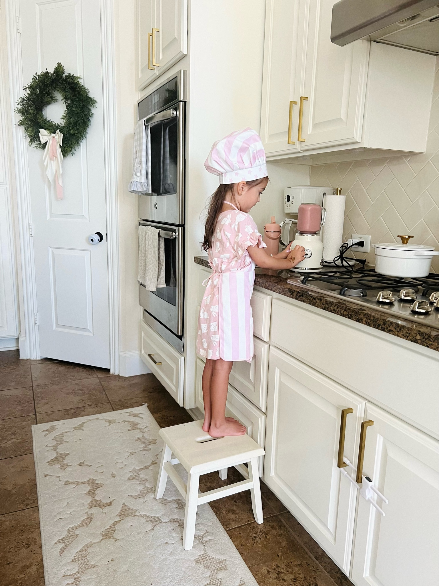 Baby girl is going to find every reason to wear her new apron 😆🥰👩‍🍳🤍 she’s making smoothies for her self and for her brother🤍

#LTKHome #LTKFamily #LTKSaleAlert