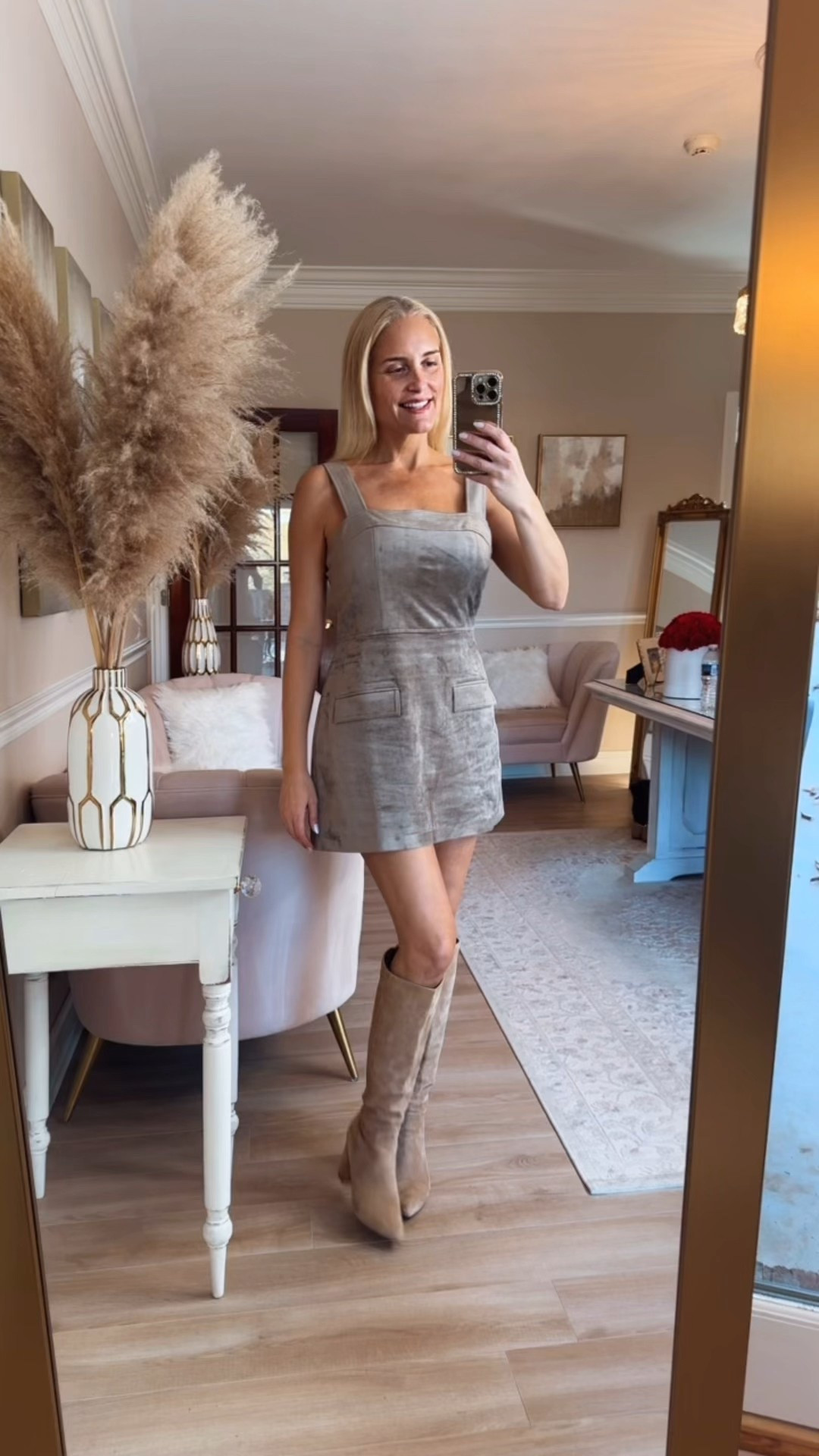 The cutest taupe faux suede dress. Also comes in a gorgeous rust color. I'm wearing a size medium and it's way too big in the waist but fits my 34DD bust. Suggest this for smaller busts only and size down for the waist. Also linking some gorgeous knee-high beige suede boots.

#LTKStyleTip #LTKSeasonal