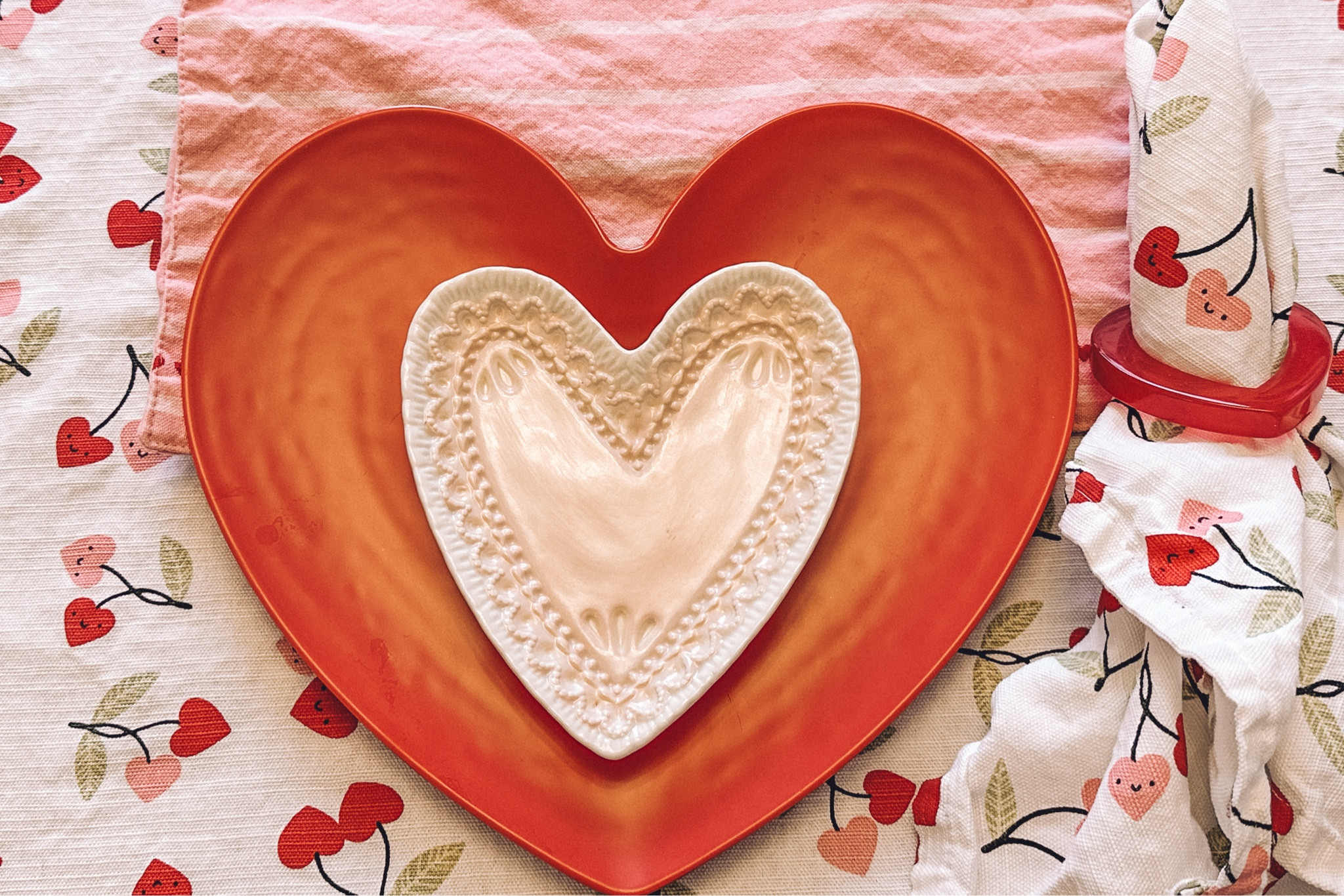 The cutest table setting for Valentine’s Day! I got the napkins, napkins rings, and tablecloth in-store at Home Goodss

#LTKSeasonal #LTKHome