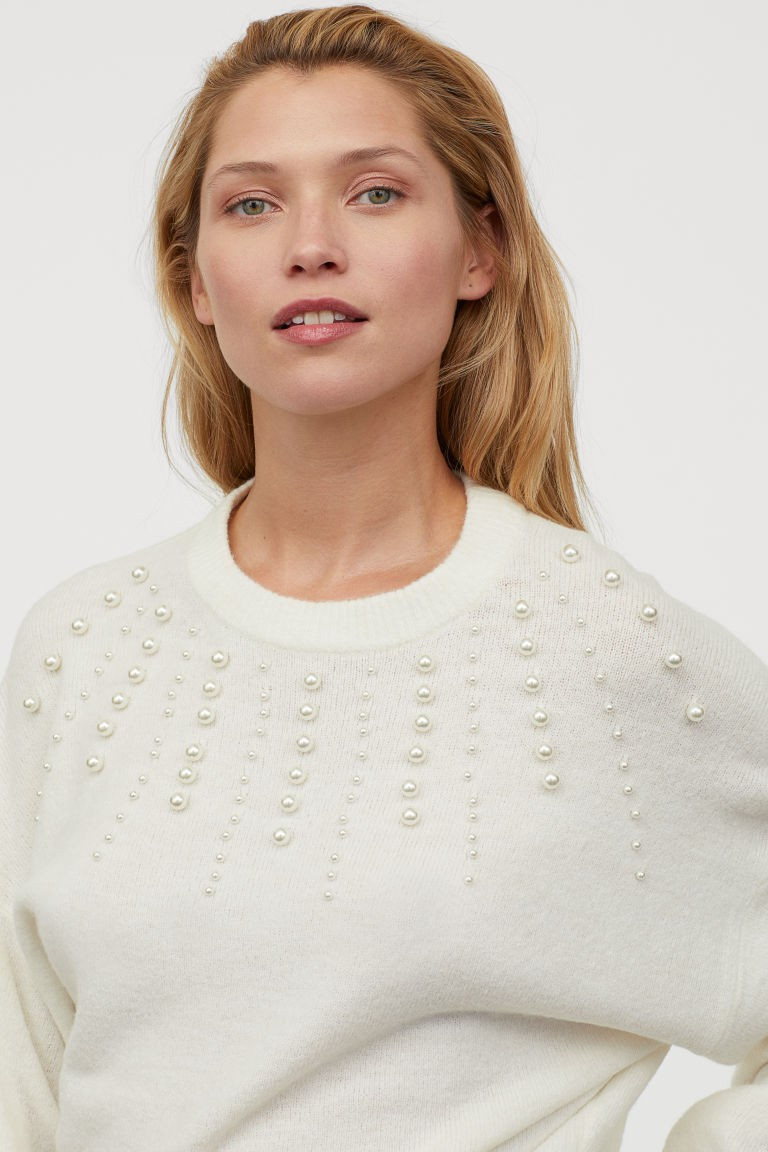 Jumper knitted in a soft wool blend with decorations. Low dropped shoulders, long sleeves and rib... | H&M (UK, MY, IN, SG, PH, TW, HK)