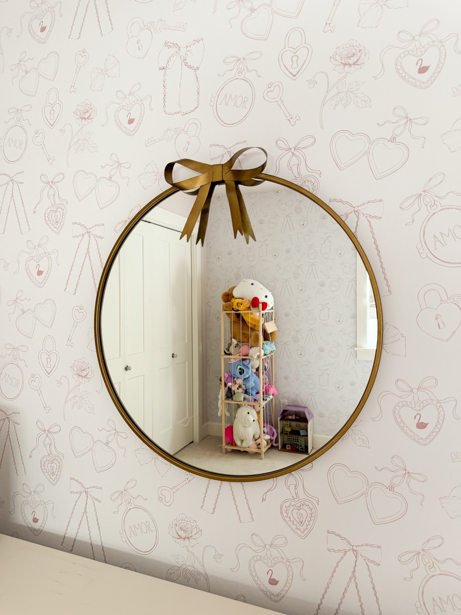 The cutest gold bow round mirror for the girls kids room! Currently 30% off!

#LTKsummer #LTKkids #LTKhome