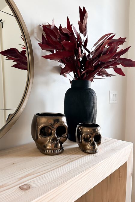 These skulls are so cute! And I could not pass this vase up. It’s perfect for Halloween. 
.


#LTKHalloween #LTKhome #LTKstyletip