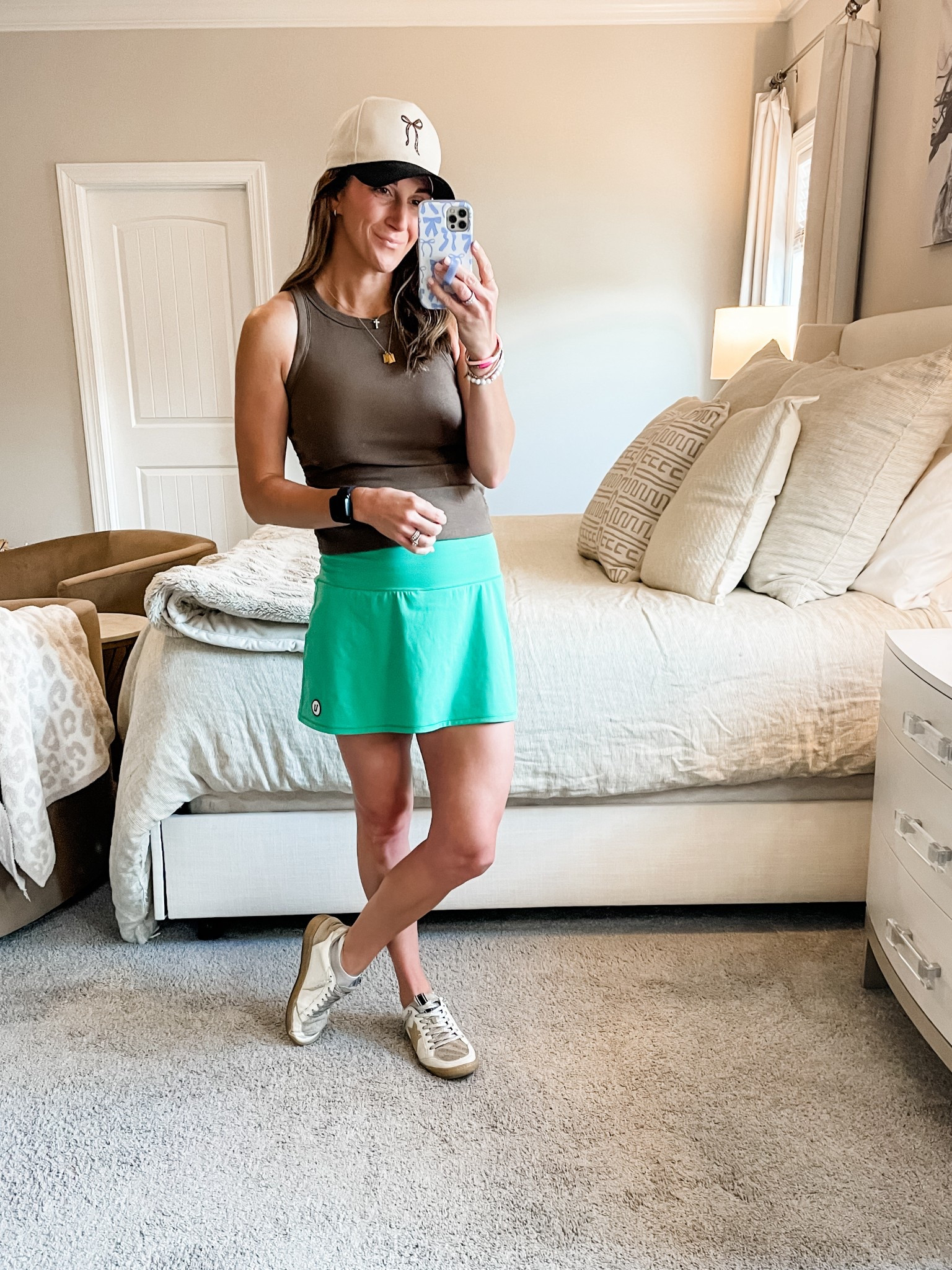 Friday fit

Tank: size medium, stretchy, slightly cropped, tts comes in other colors
Skirt is a skort and has pockets under! This color is available in a few sizes but comes in other colors too!
Shoes are old Shu Shop. Linking some similar 

Hat & accessories linked too

Skirt  | skort | green | tank | hat | shoes | sneakers | daily | active | hat | earrings | bracelets | necklace | accessories | tiny tags | cross | Allie + bess | fitness | athleisure 



#LTKFindsUnder100 #LTKSaleAlert #LTKStyleTip