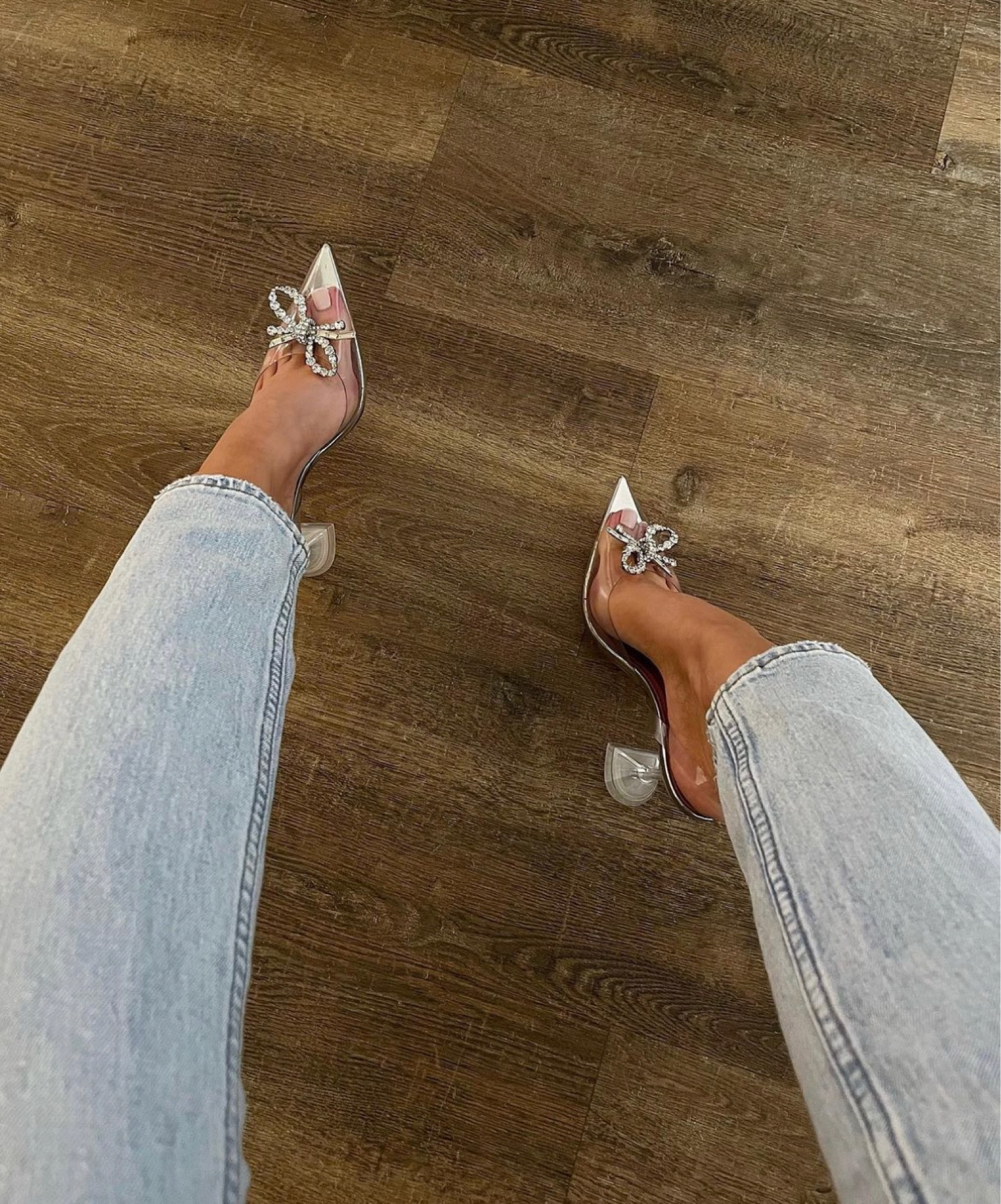 A Cinderella shoe ⭐️ Topped with a crystal adorned bow, these clear Rosie slingback heels by Amina Muaddi are a splurge! A similar pair at a lower price point is linked.

#LTKshoecrush #LTKFind #LTKstyletip