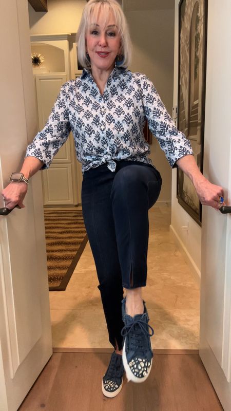  No Iron stretch Ikat  button down shirt.
Travelers pull on jeans.
Denim sneaker with rhinestones on the toes. All perfect for travel or just doing your thing. I am wearing a size 0 on both pieces. 
@lovechicos travel style. 

#LTKover40 #LTKSeasonal #LTKtravel