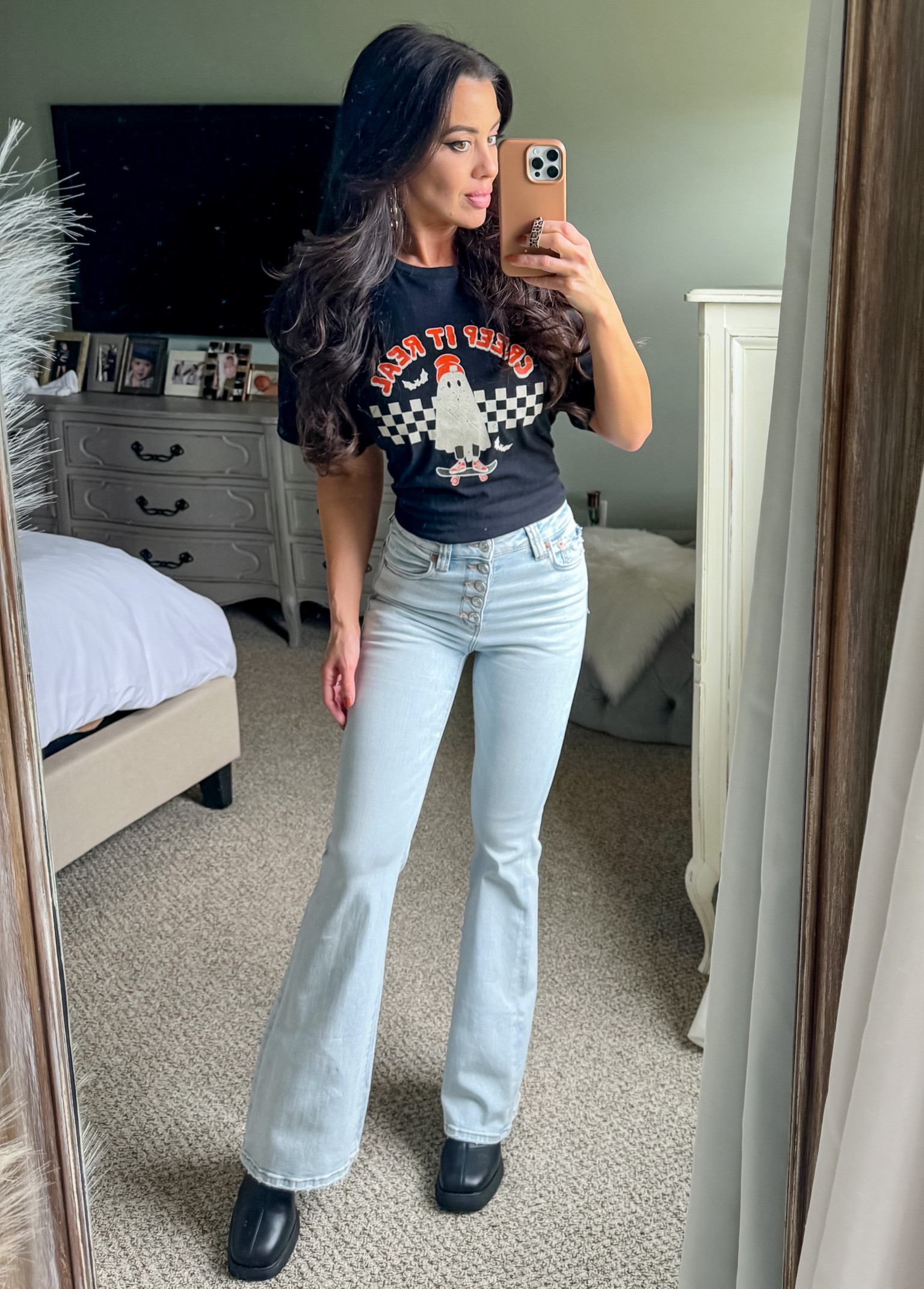 Halloween tee. Flare jeans. Platform sock boots. Etsy finds. Halloween graphic. Haunted house  

#LTKHalloween #LTKSeasonal #LTKfindsunder50