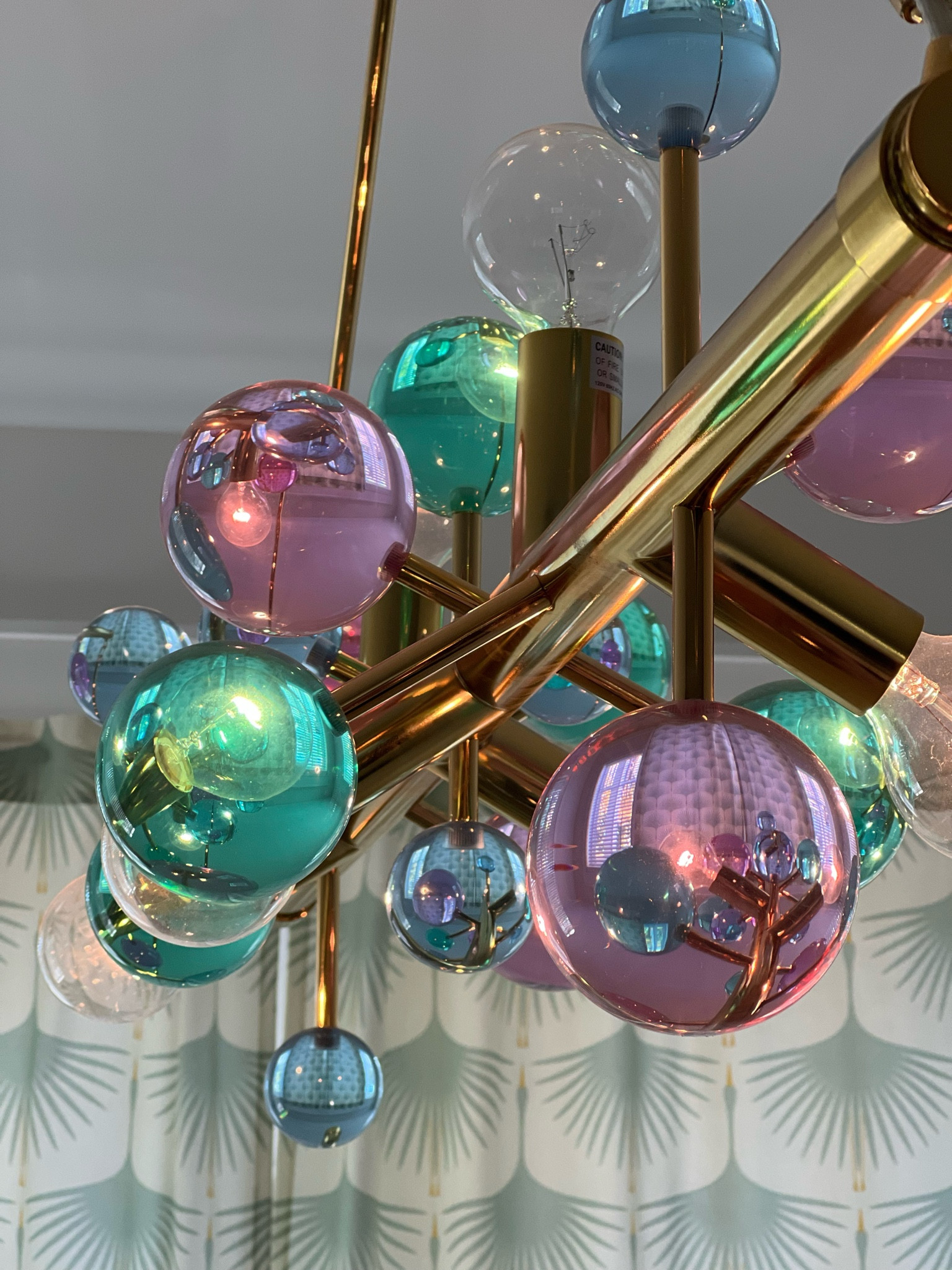 Jonathan Adler’s globo light fixtures are breathtaking! The picture doesn’t do it justice at all. I fell in love with piece on our nomadic travels and it’s my goal to get this for our dining room area. It fits our color scheme perfectly with our gold, white, pinks, blues and mints 😍 #gorgeous #decorinspo #lighting #luxhomedecor

#LTKHome #LTKTravel #LTKStyleTip