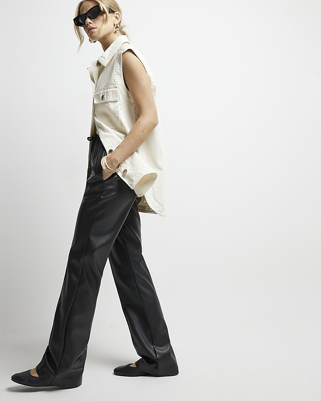 Black faux leather wide leg trousers | River Island (UK & IE)