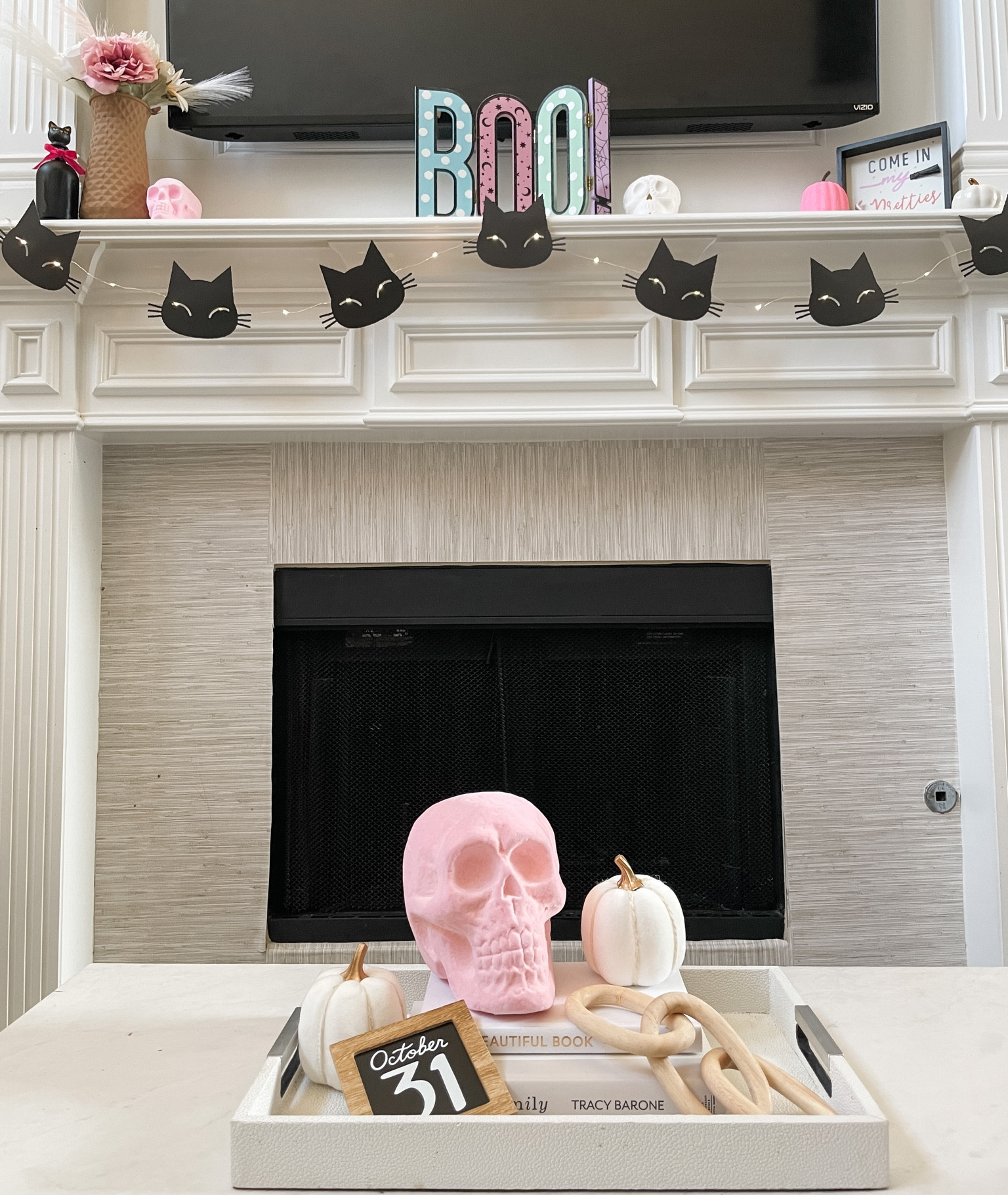 Halloween pastel colored decor. 
I made the light up cat garland. So easy to make, I have a video saved under  “Halloween” Collections  

#LTKSeasonal #LTKhome #LTKHalloween