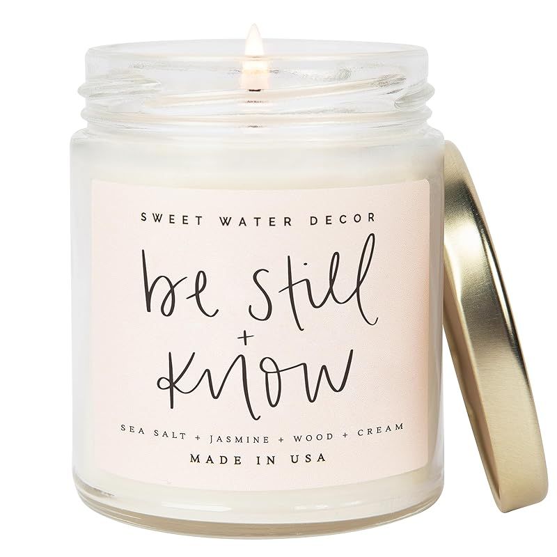 Sweet Water Decor, Be Still and Know, Sea Salt, Jasmine, Cream, and Wood Scented Soy Wax Candle f... | Amazon (US)