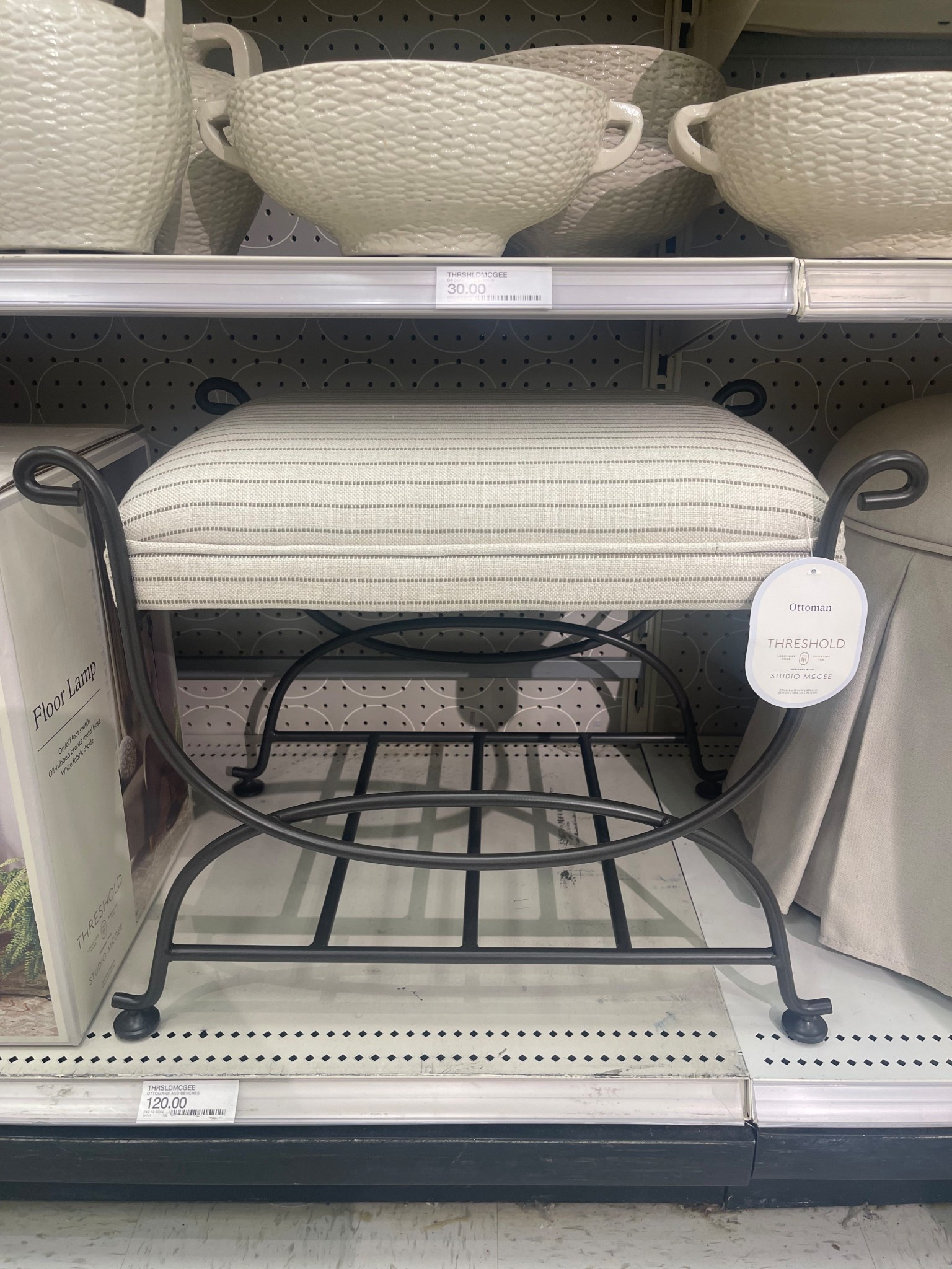 Designer look for less ottoman with striped fabric pattern! 