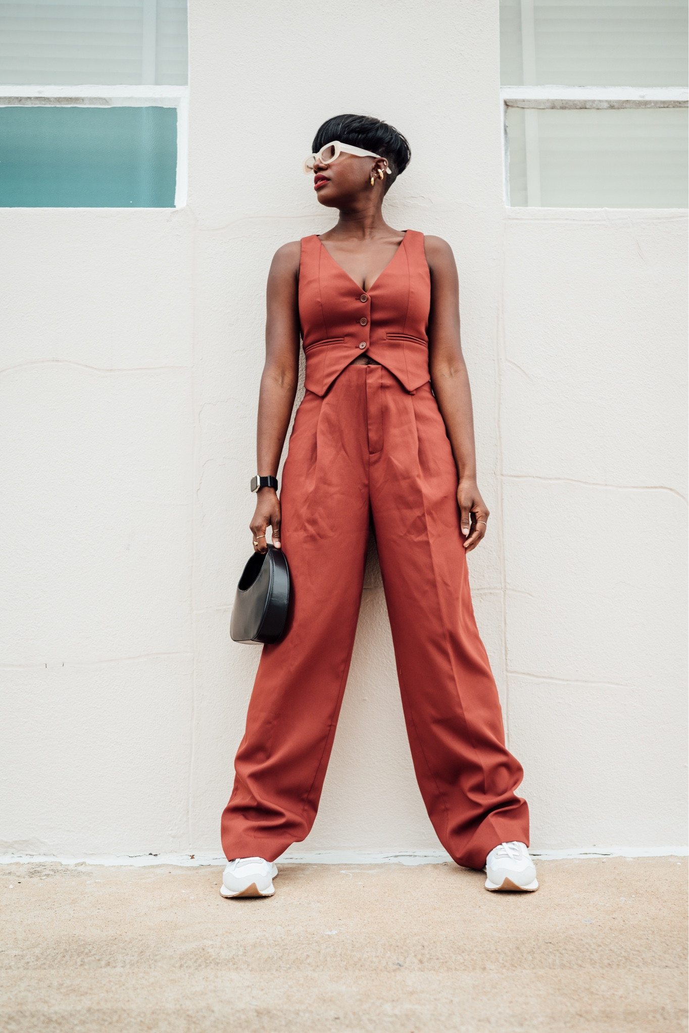 Rust vest and pants for a spring feel on suiting. New balance 237 and black Anine Bing black mini bag  

#LTKworkwear #LTKshoecrush