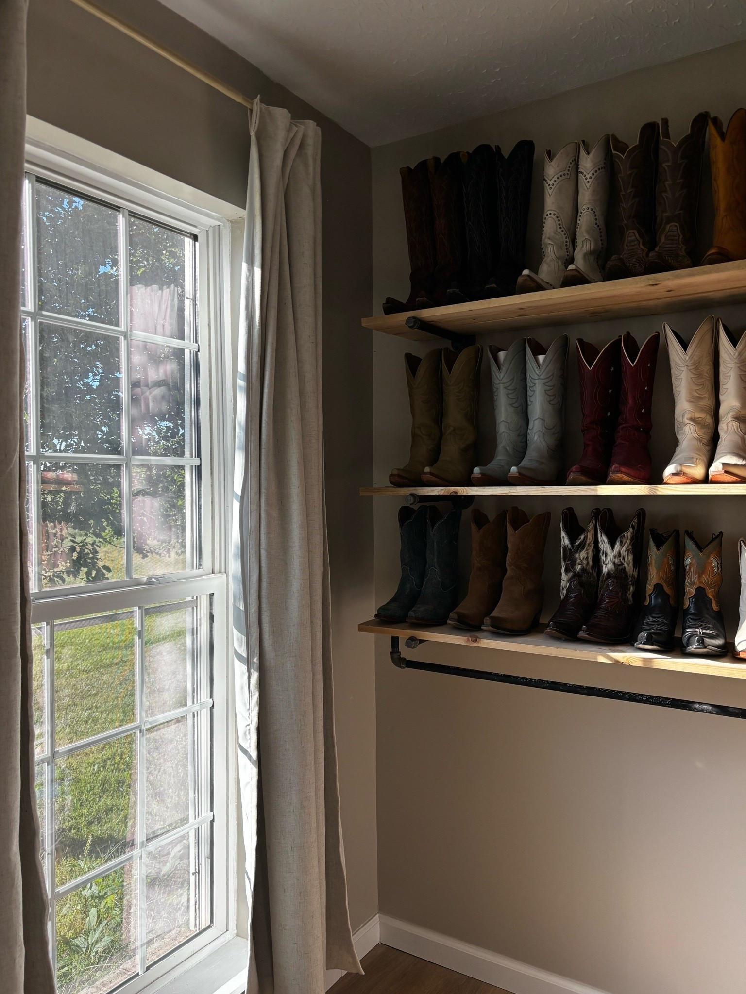 New room upgrade! Boot wall hung ✅ and we put a hanging bar on the bottom for jeans or jackets and any purses/accessories!

#LTKWorkwear #LTKSeasonal #LTKHome