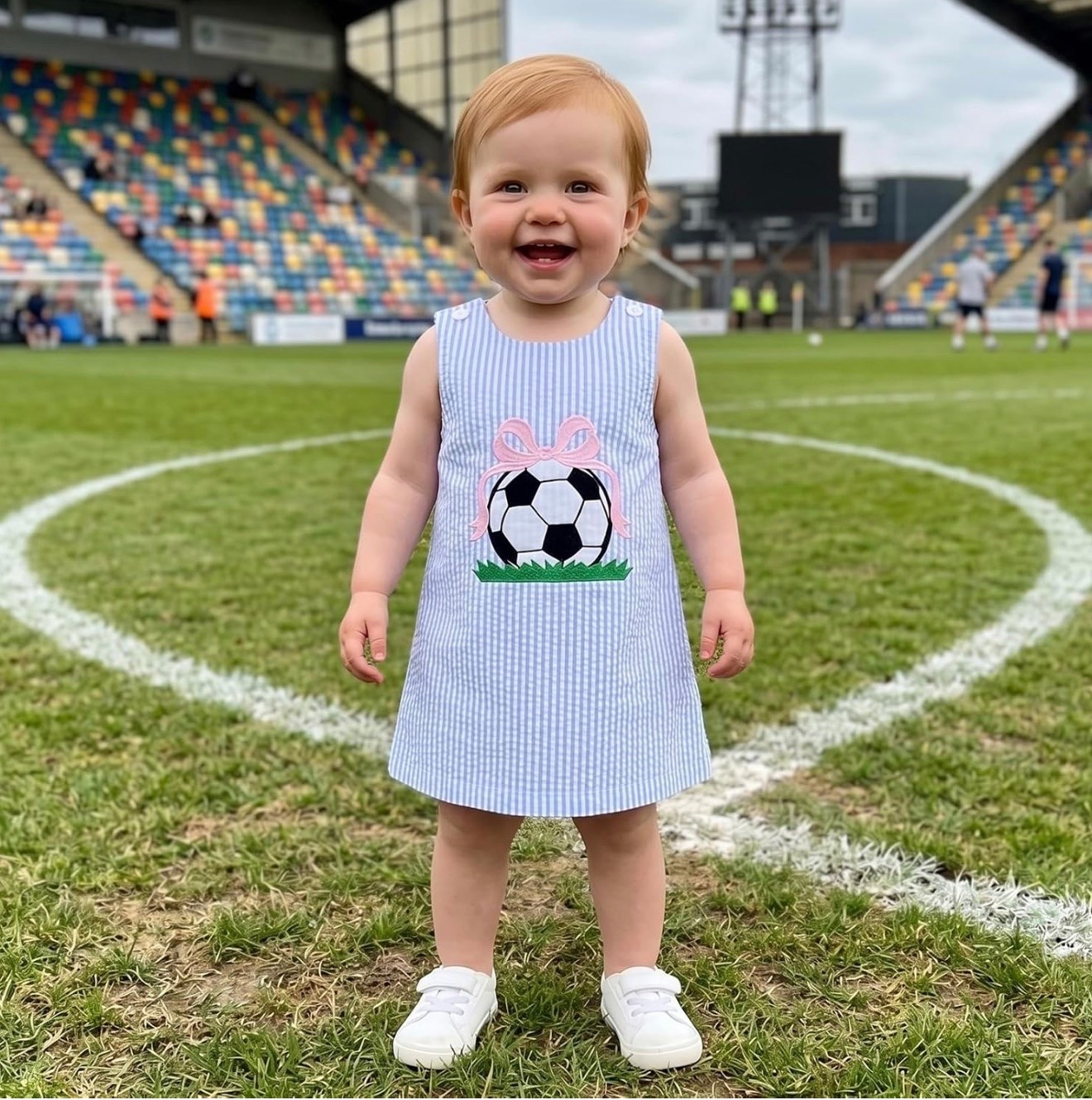 Sweet Soccer Style for Little Girls ⚽️🎀

The cutest dress for your little soccer fan! This blue seersucker A-line dress features an adorable soccer ball appliqué topped with a pink bow for the perfect blend of sporty and sweet. Lightweight, comfortable, and easy to wear, it’s perfect for soccer games, team events, sibling sidelines, school spirit days, and summer outings.

Pair it with classic white sneakers for an effortless look that’s ready for cheering from the sidelines in style. Such a precious option for soccer season and beyond!

Toddler soccer outfit, girls soccer dress, soccer mom finds, toddler game day outfit, blue seersucker dress, bow soccer dress, girls athletic style, toddler summer dress, soccer season outfit, little girl game day look, sporty and sweet style, toddler boutique look, girls embroidered dress, youth soccer fashion, soccer sideline style. ⚽️💙🎀✨

#LTKKids #LTKBaby #LTKActive