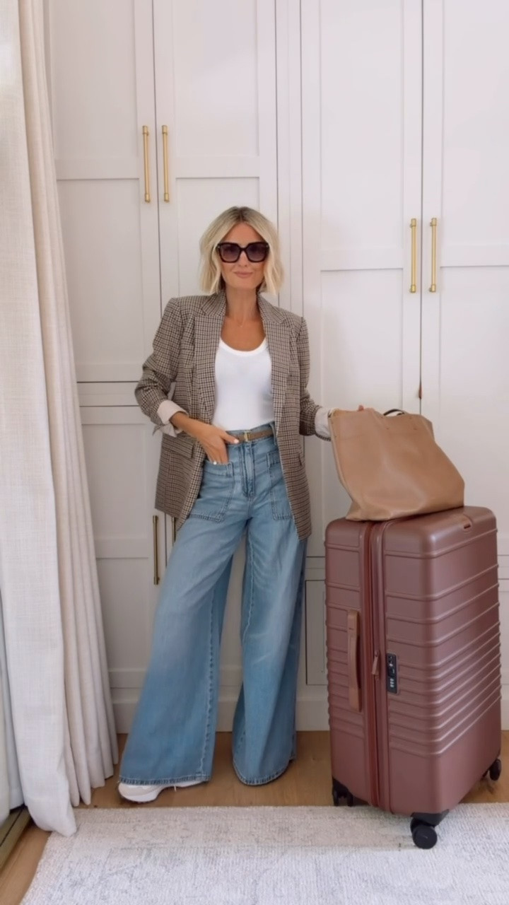 These wide leg jeans are SO comfortable! They are a great pair of jeans for travel! I just added this blazer & a basic tee to make a more elevated travel outfit! Wearing 0 in the blazer, S in tank, & 2 in the jeans!

Loverly Grey, Target, wide leg jeans, blazer, plaid blazer, travel outfit, airport outfit, Beis luggage

#LTKSeasonal #LTKTravel