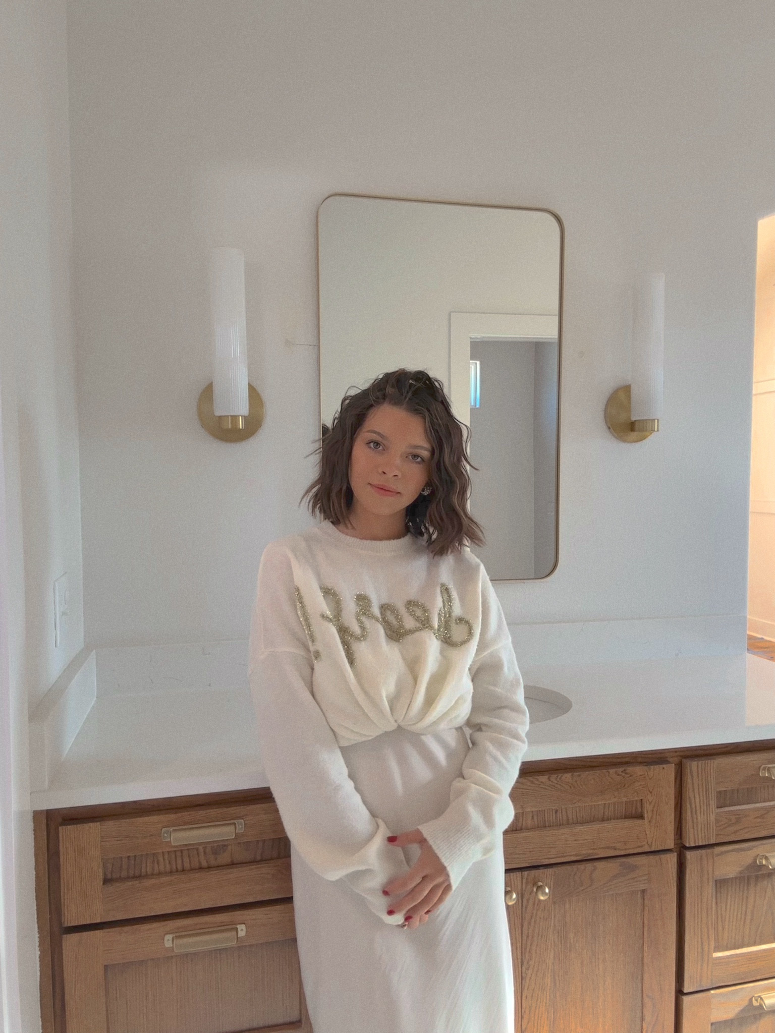 A perfect pair 🤎 west elm sconces and a QOS sweater ✨ 

#ltkfind #homedecor #fashion 

#LTKhome #LTKstyletip