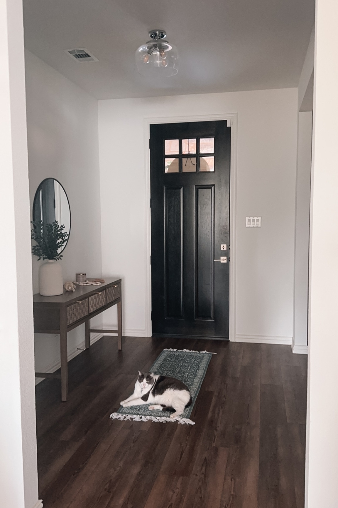 Entry way set up so far! Rug is from Walmart! 

#LTKFamily #LTKHome