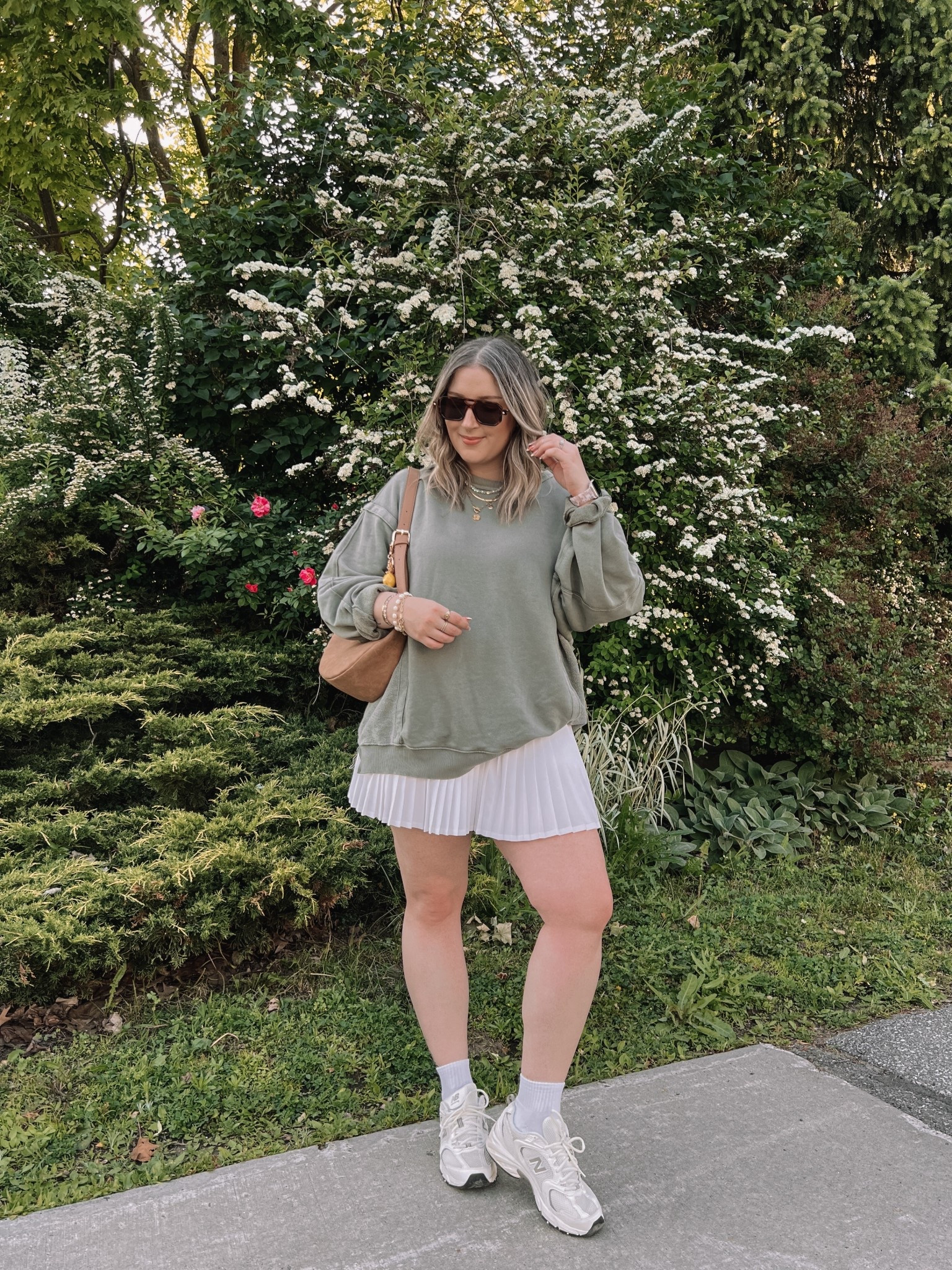 Casual spring outfit from last year! Olive green sweatshirt runs big, I sized down 1. white tennis skirt is tts. New balance sneakers are so comfy but run big, I sized down .5


#LTKstyletip #LTKsummer #LTKmidsize