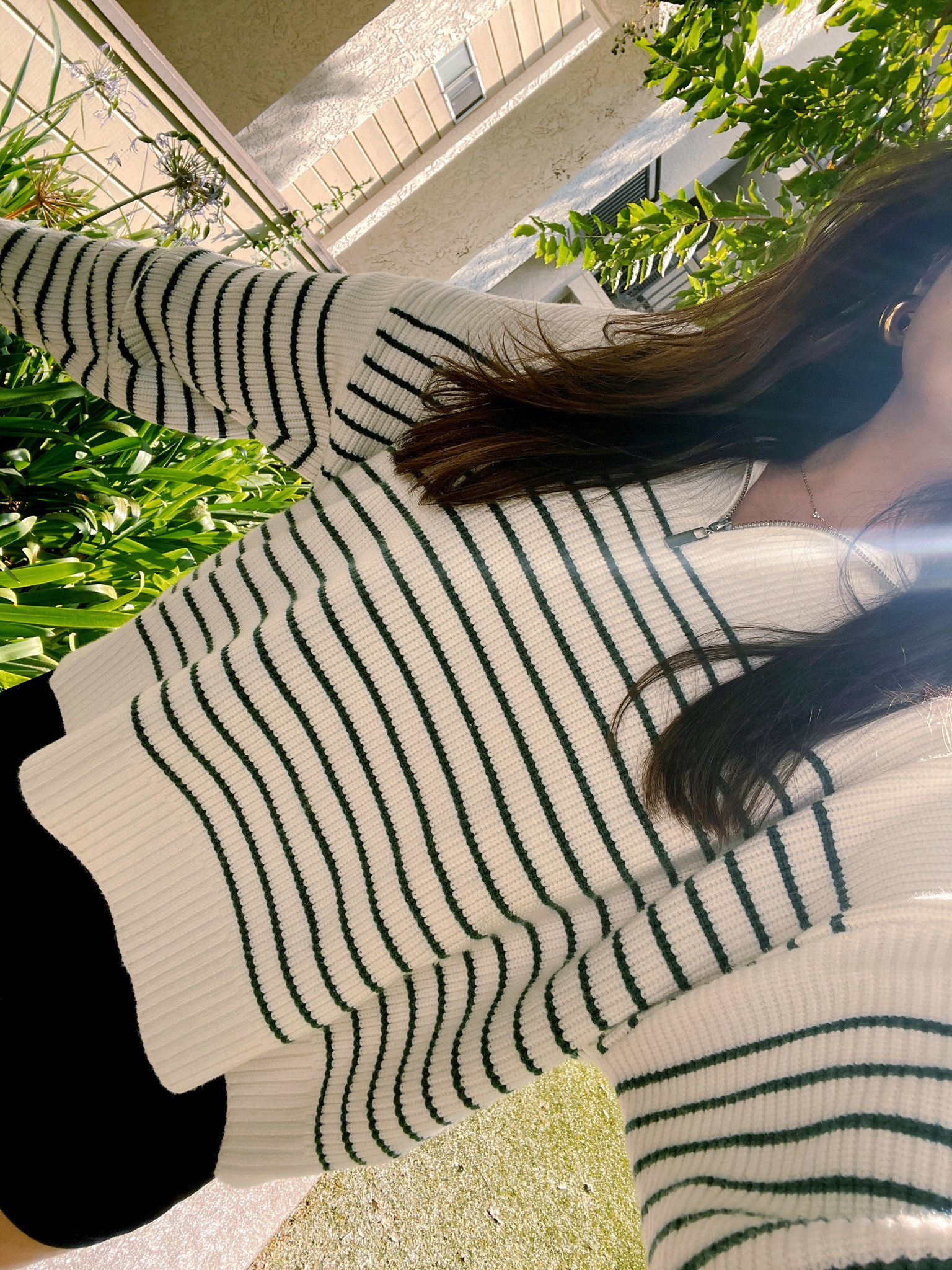 The perfect fall sweater for layering! Comes in two colors: Green Stripes & Black Stripes. Wearing size Small. Size up for a more oversized fit.

#LTKstyletip #LTKFind #LTKunder100