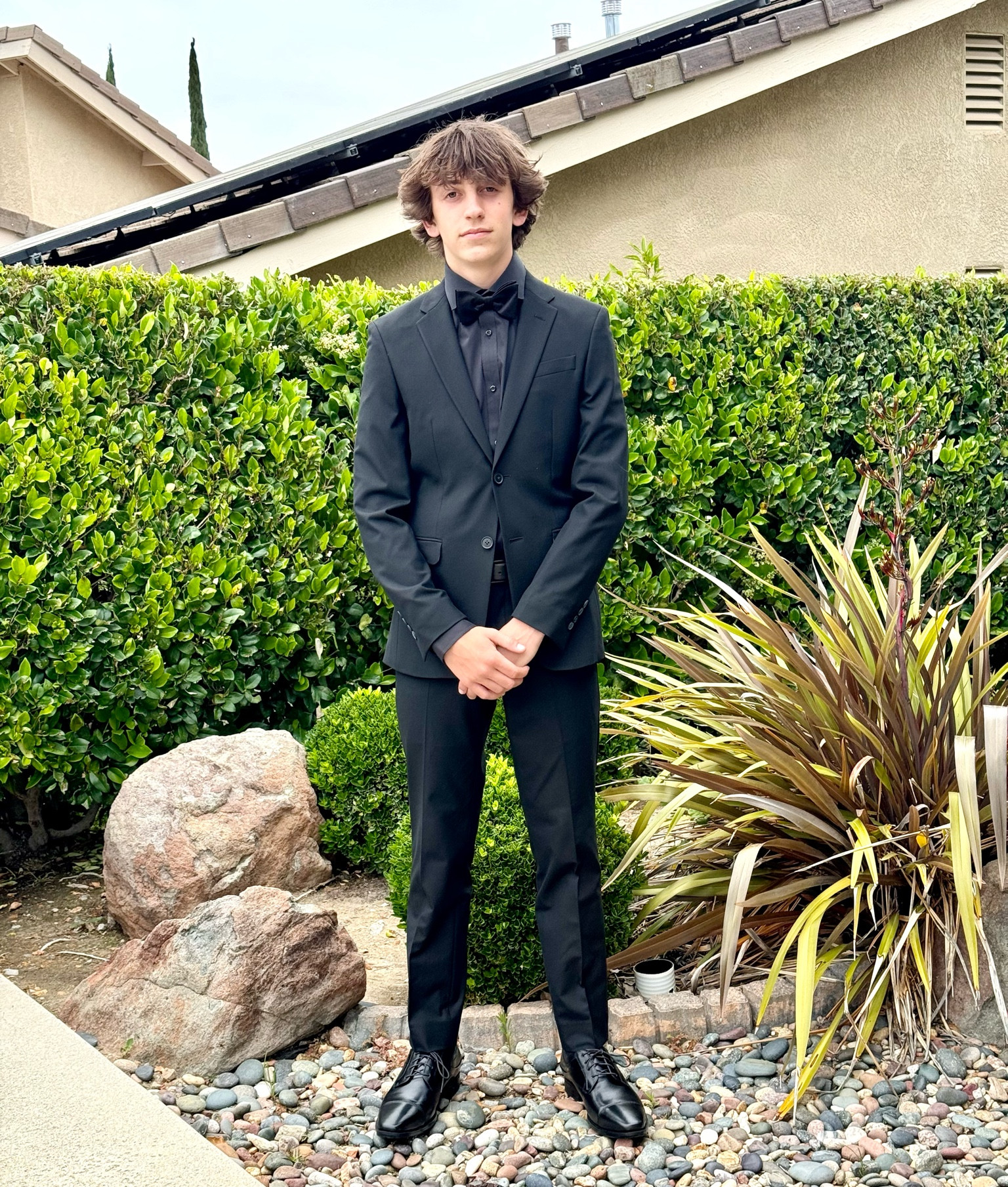 Teen boy suit 😎don’t you love seeing your kids dress for a formal occasion? This all black suit with black shirt, black bowtie and shoes is so in right now! For graduations, weddings, family events. Some items on sale - sharp dressed man style! 

#LTKFamily #LTKSaleAlert #LTKKids