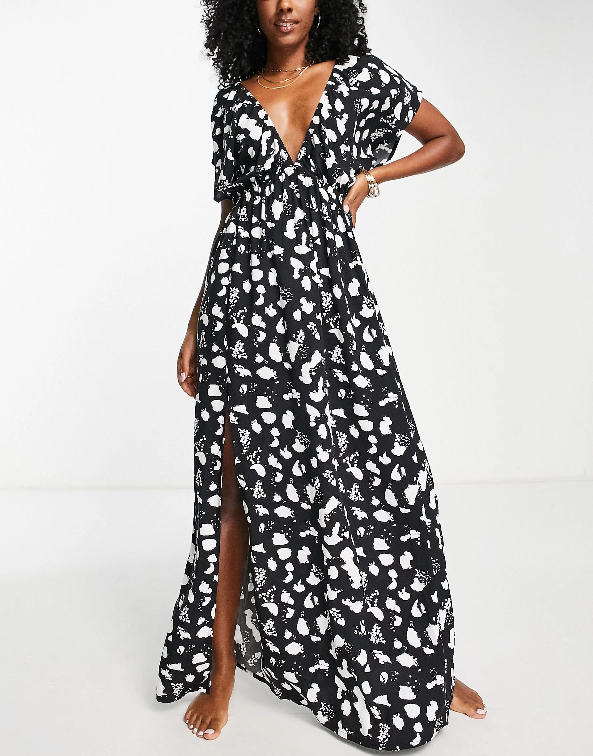ASOS DESIGN flutter sleeve maxi beach dress in mono spot print | ASOS (Global)