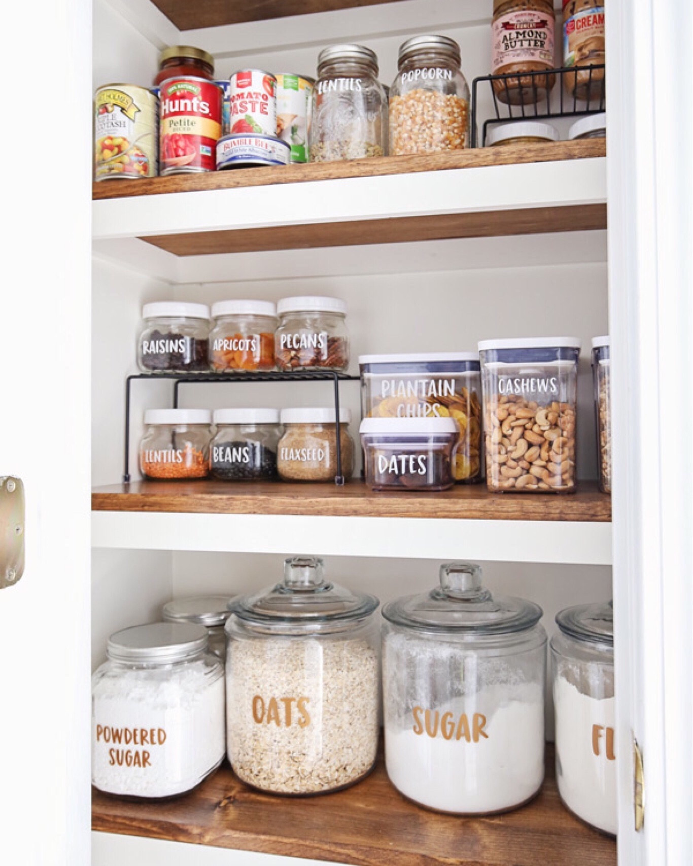 Pantry makeover organization.

Large glass jars 1 gallon amazon
Mason jar wide mouth lids plastic white amazon
Kitchen pantry shelves metal black amazon 
Oxo good grips 3 pack 1.1 qt amazon 
Oxo good grips 1.7 qt amazon 
Mason jars 16 oz wide mouth amazon

#LTKhome #LTKfindsunder50 #LTKsalealert